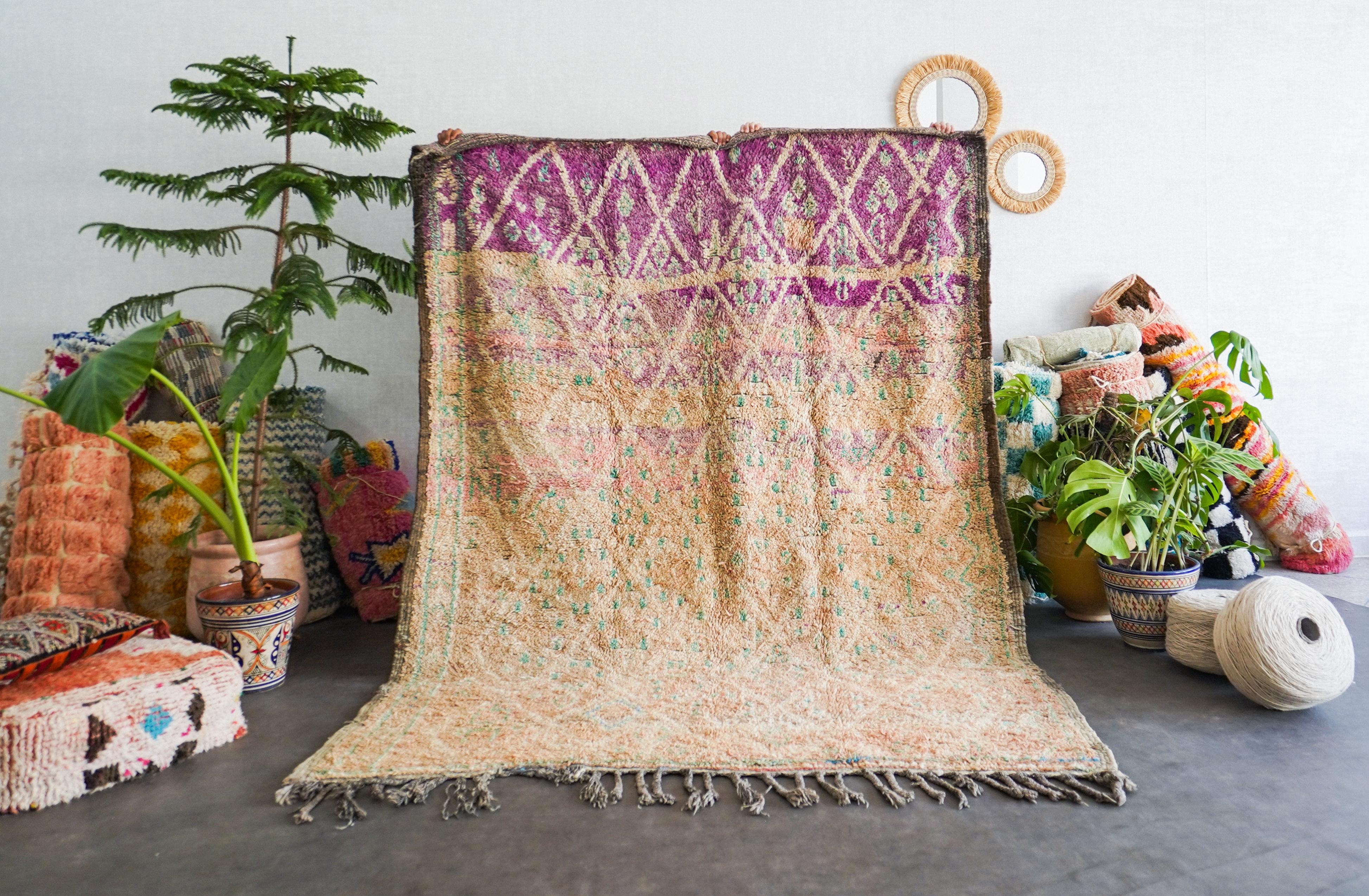 KD02 6.8x9 Ft 205x270 Cm - 1

KD03 6.6x14 Ft 200x420 Cm

Uncover the rich heritage woven into our beige & purple Moroccan vintage rug. Handmade by skilled artisans using time-tested techniques, each Berber rug is a unique narrative, echoing the