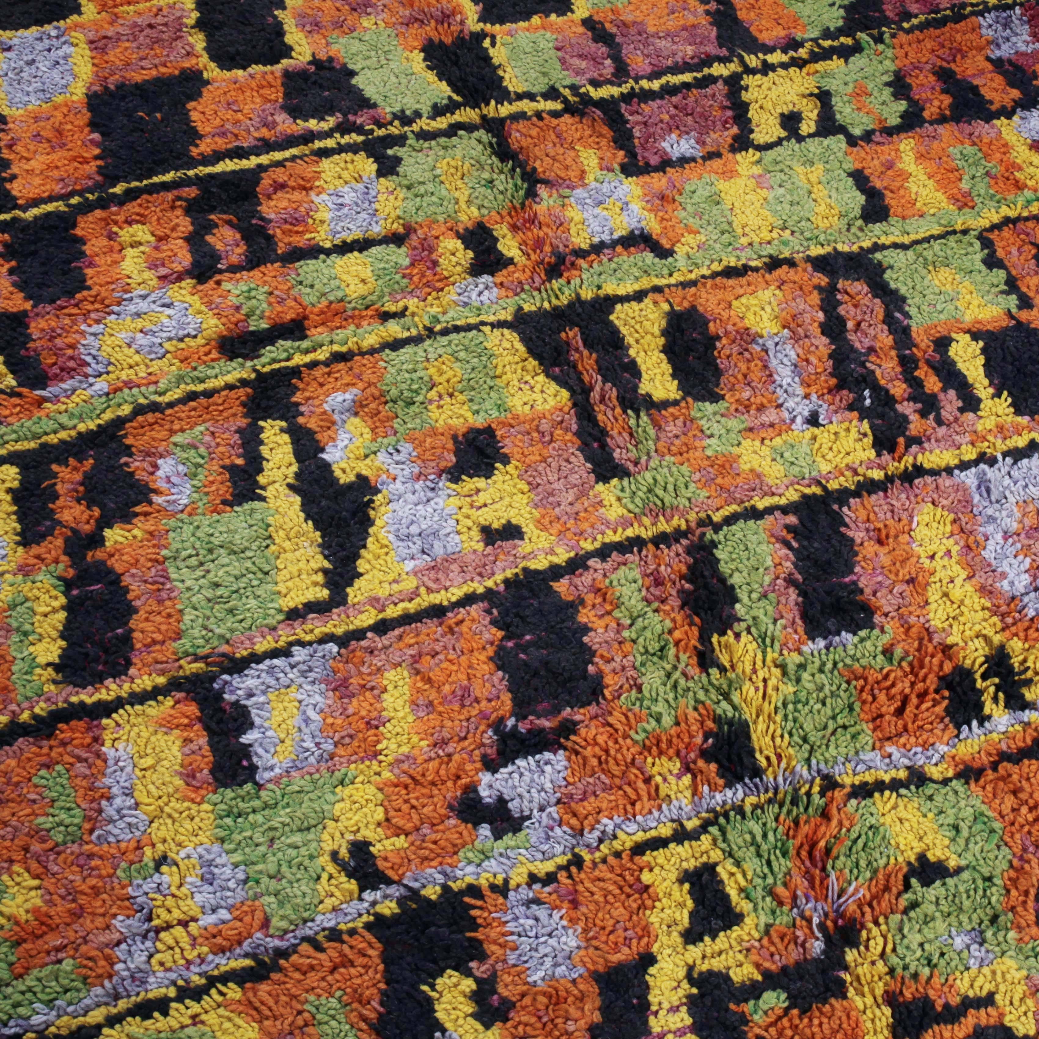 An extraordinary hand knotted woollen carpet from the Aït Bou Ichaouen tribe.

This seductive pattern and brazen color combination resonates far beyond the weavings of traditional Berber arts and is on par with abstract color field painting and