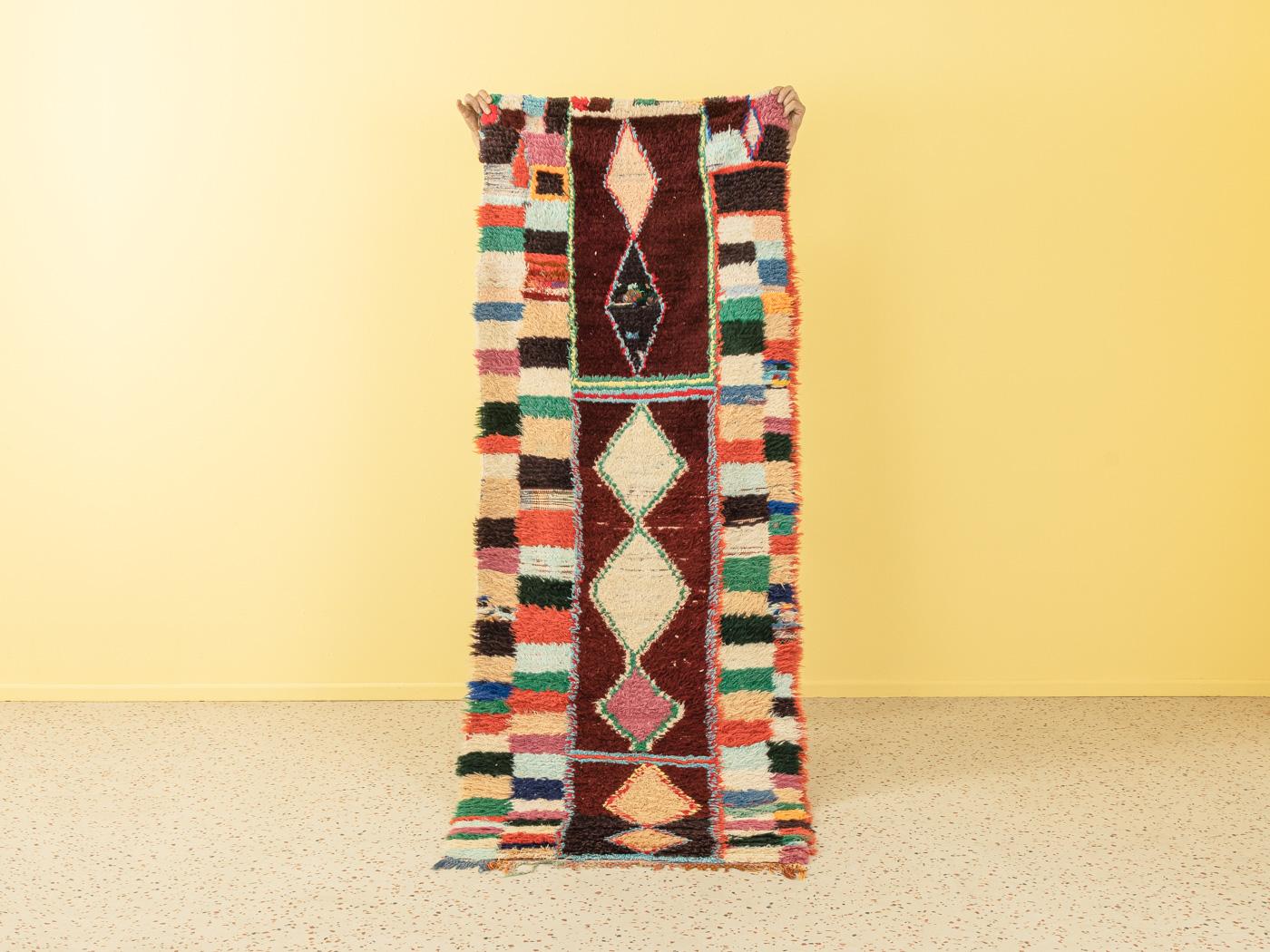 This Boucherouite is an upcycled vintage Berber rug that includes old fabrics and clothes – thick and soft, comfortable underfoot. Our Berber rugs are handmade, one knot at a time. Each of our Berber rugs is a long-lasting one-of-a-kind piece,