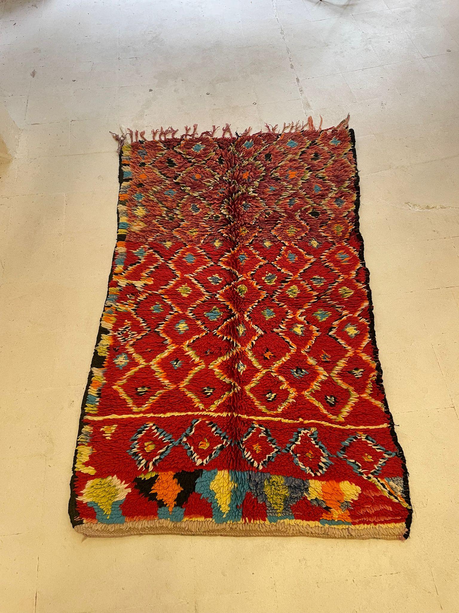 Wool Vintage Moroccan Boucherouite Rug with Vibrant Diamond Motifs, Circa 1970s For Sale