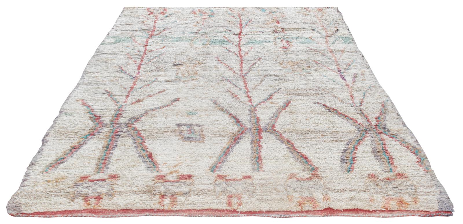 Our vintage Moroccan rugs are part of a skillfully curated collection of rare and unusual designs. They are made of all-natural dyes and 100% handspun wool from the Atlas Mountain region in North Africa. These rugs are all one of kind as they were