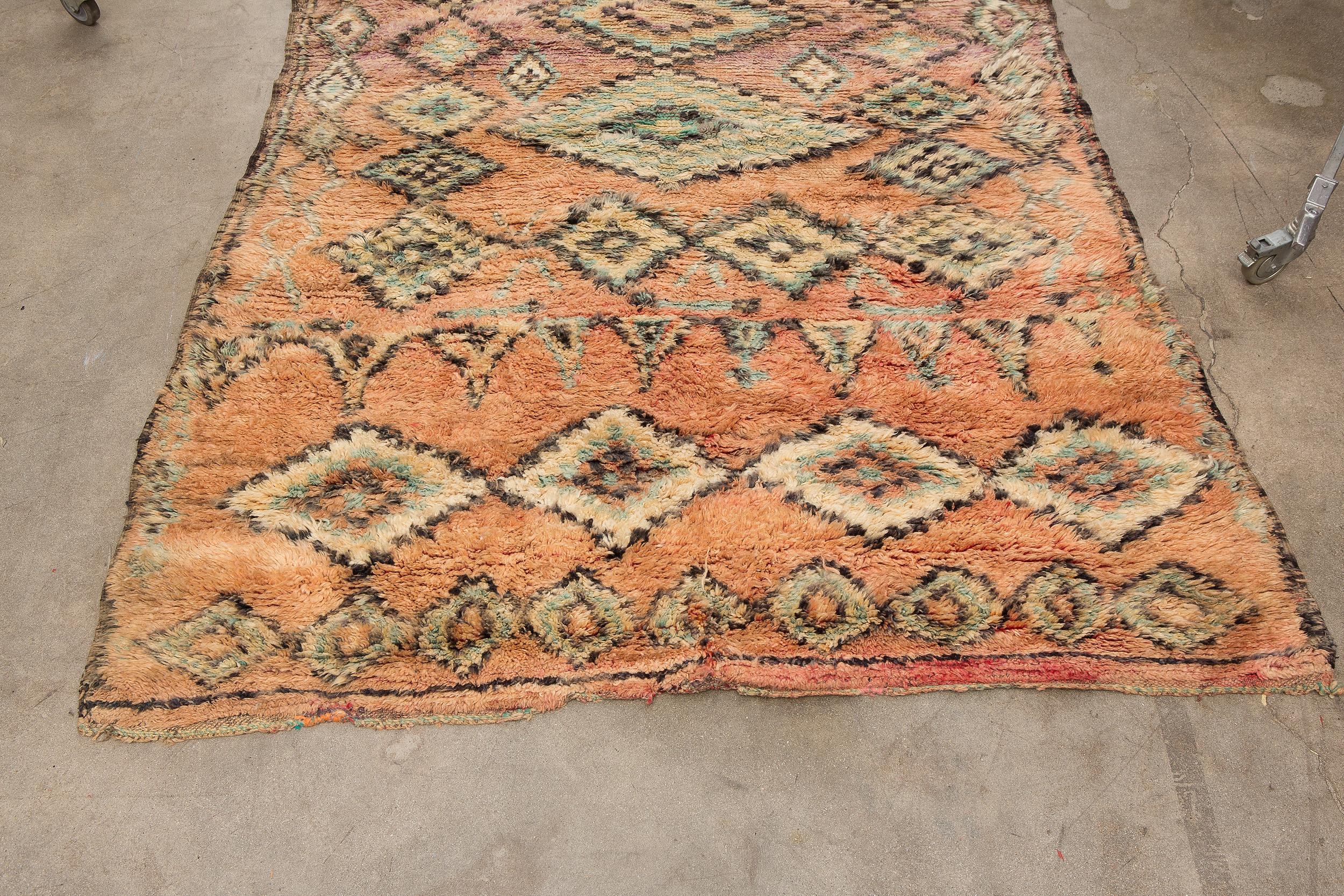 Boujad is a large widespread area and not a tribe. Since they are woven by a number of tribes so they can display varying techniques and styles. Originating in the Middle Atlas region of Morocco, Boujad rugs are low-pile soft wool and known for