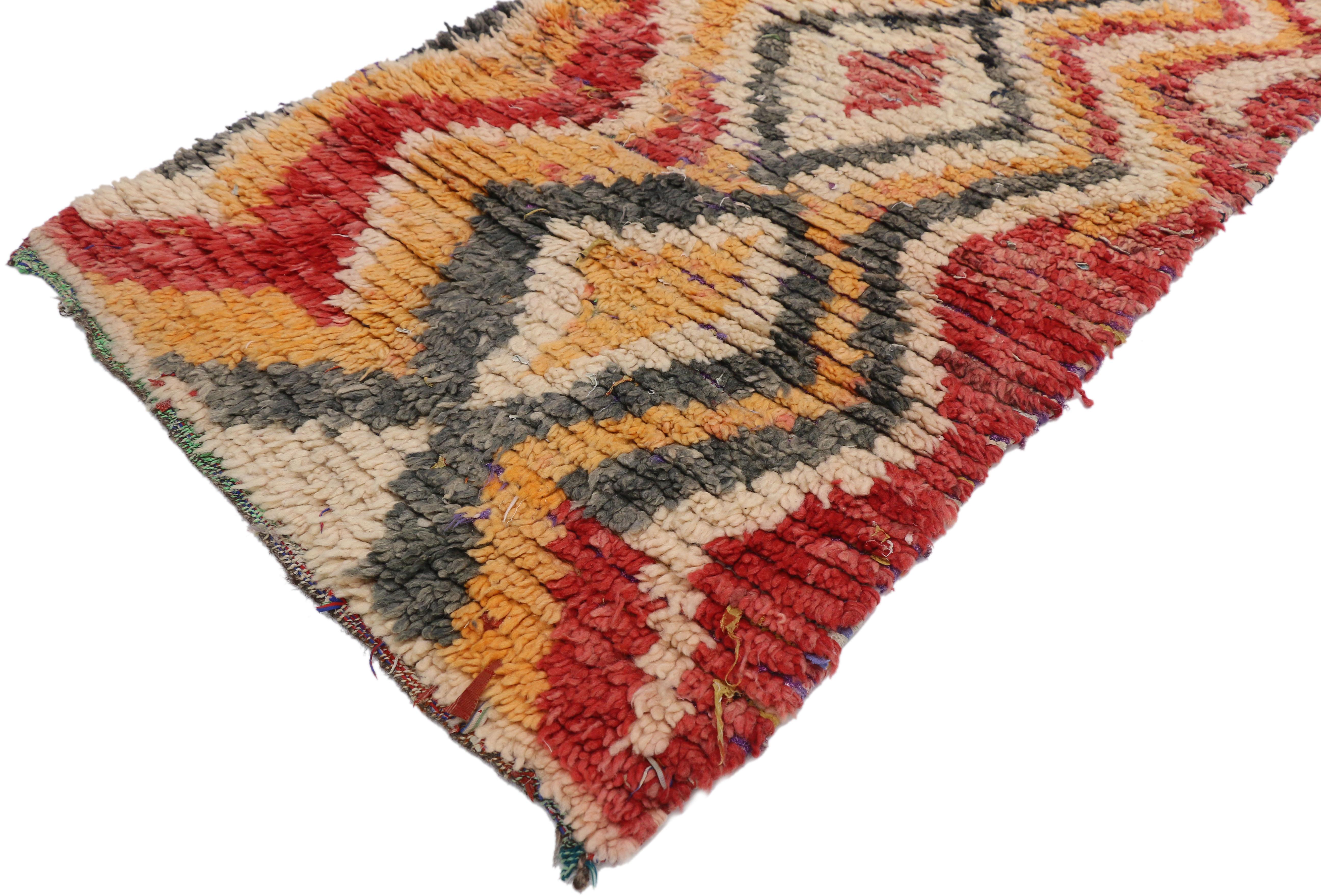 20848 Vintage Moroccan Boujad Rug, Colorful Berber Boucherouite Moroccan Azilal Rug. This vintage Moroccan Boujad rug features a column of stacked lozenges with extended sides forming a chevron pattern. Though deceptively simple, this composition