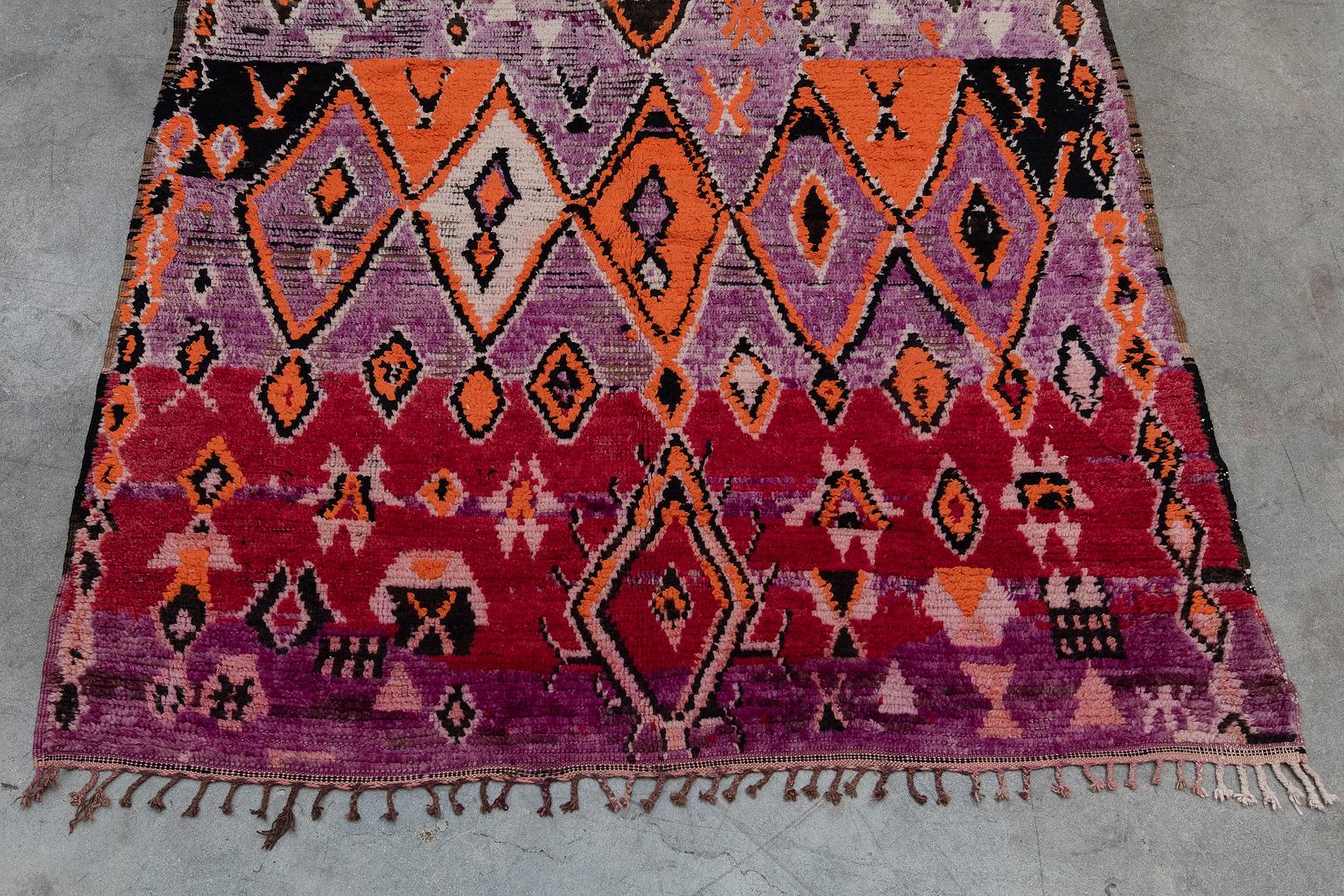 Boujad is a large widespread area and not a tribe. Since they are woven by a number of tribes so they can display varying techniques and styles. Originating in the middle atlas region of Morocco, Boujad rugs are low-pile soft wool and known for