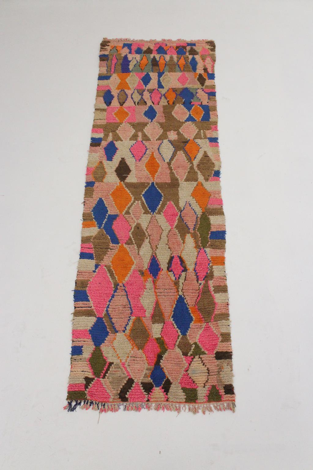 This vintage runner rug will bring the perfect bohemian vibe to your space! The pattern is a 