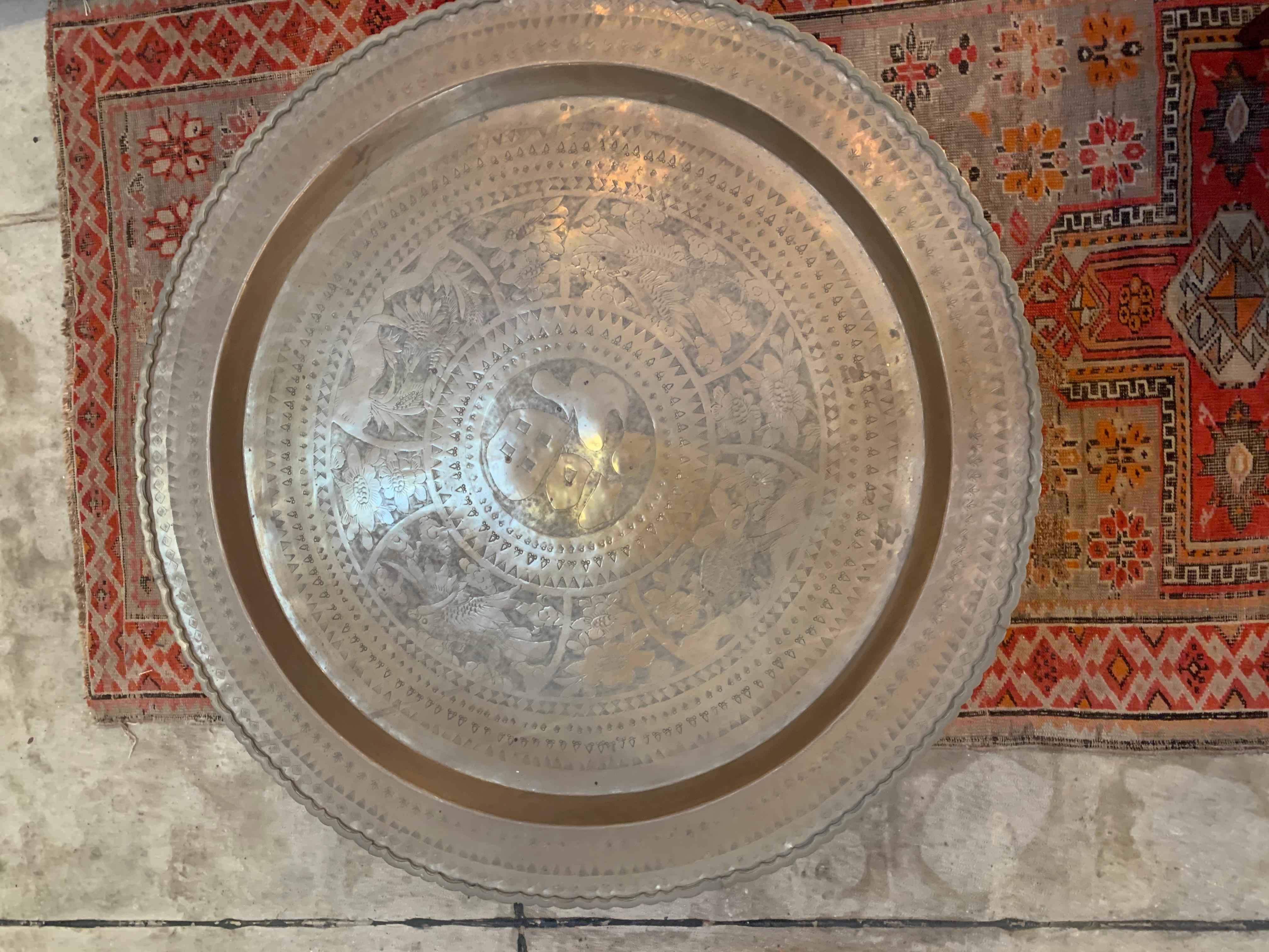 Offered is a beautiful round Moroccan brass tray table 28