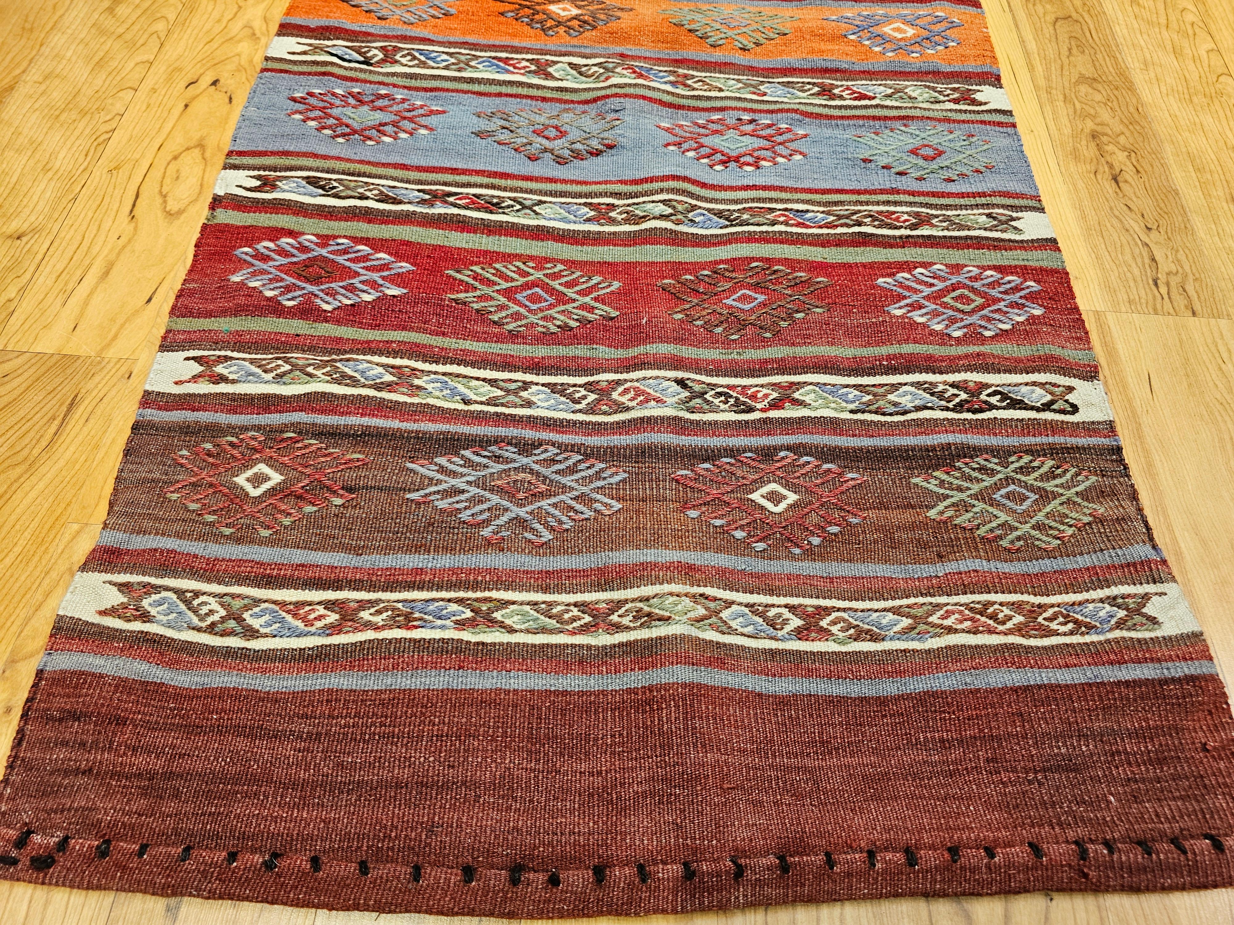 Hand-Woven Vintage Moroccan Kilim Runner in Geometric Banded Pattern in Red, Purple, Green For Sale