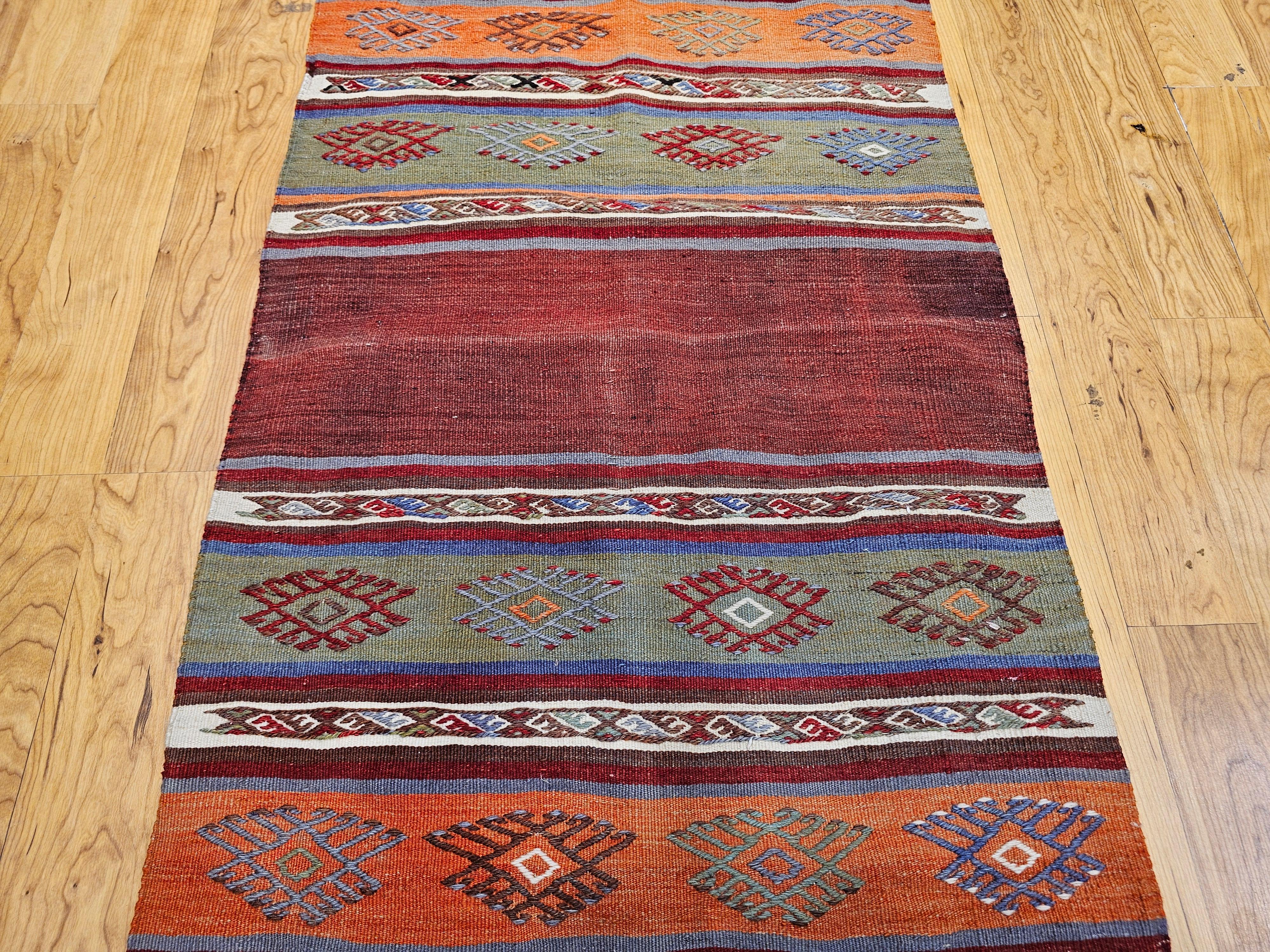 Vintage Moroccan Kilim Runner in Geometric Banded Pattern in Red, Purple, Green In Good Condition For Sale In Barrington, IL