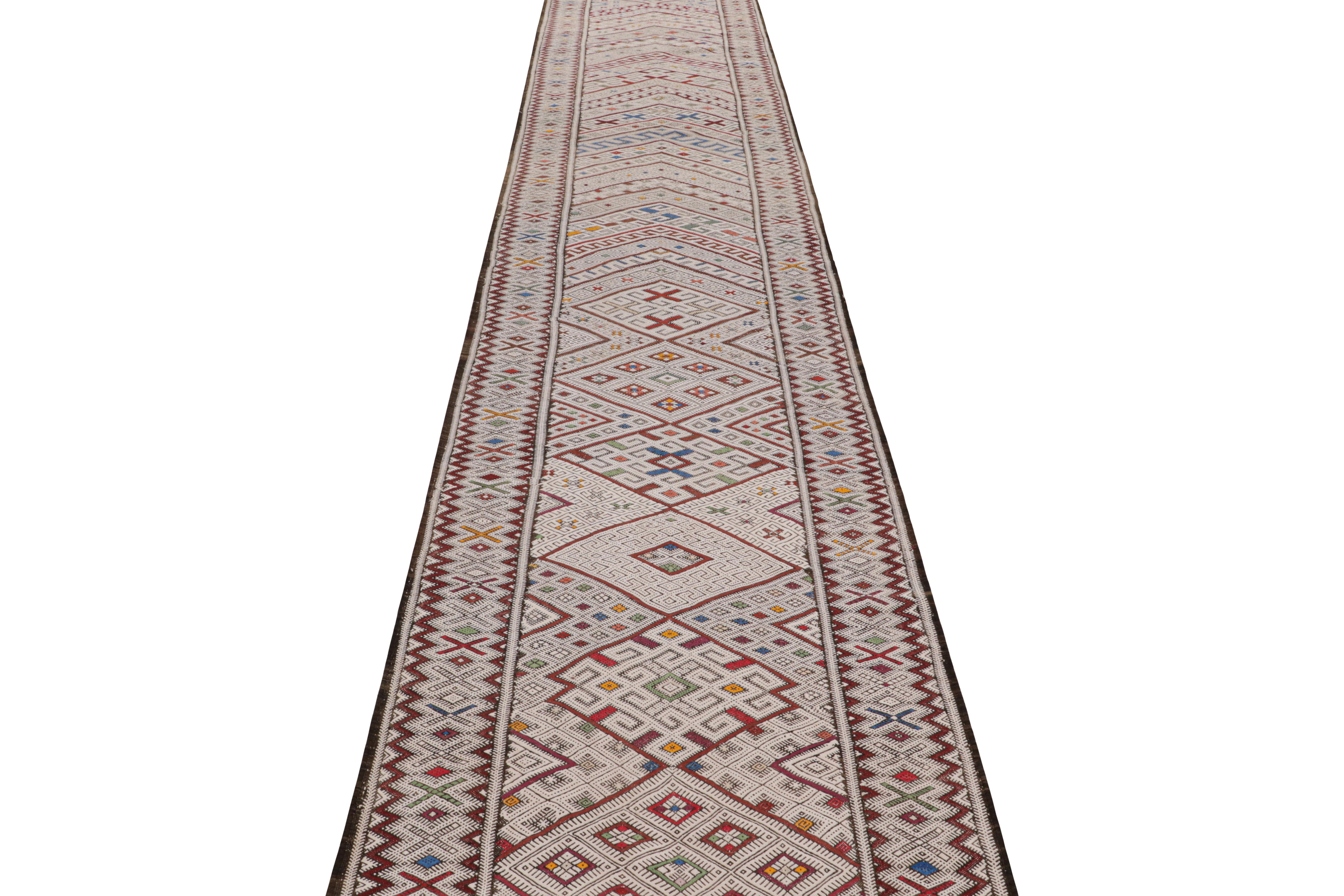 Tribal Vintage Moroccan Kilim Runner with Polychromatic Patterns by Rug & Kilim For Sale