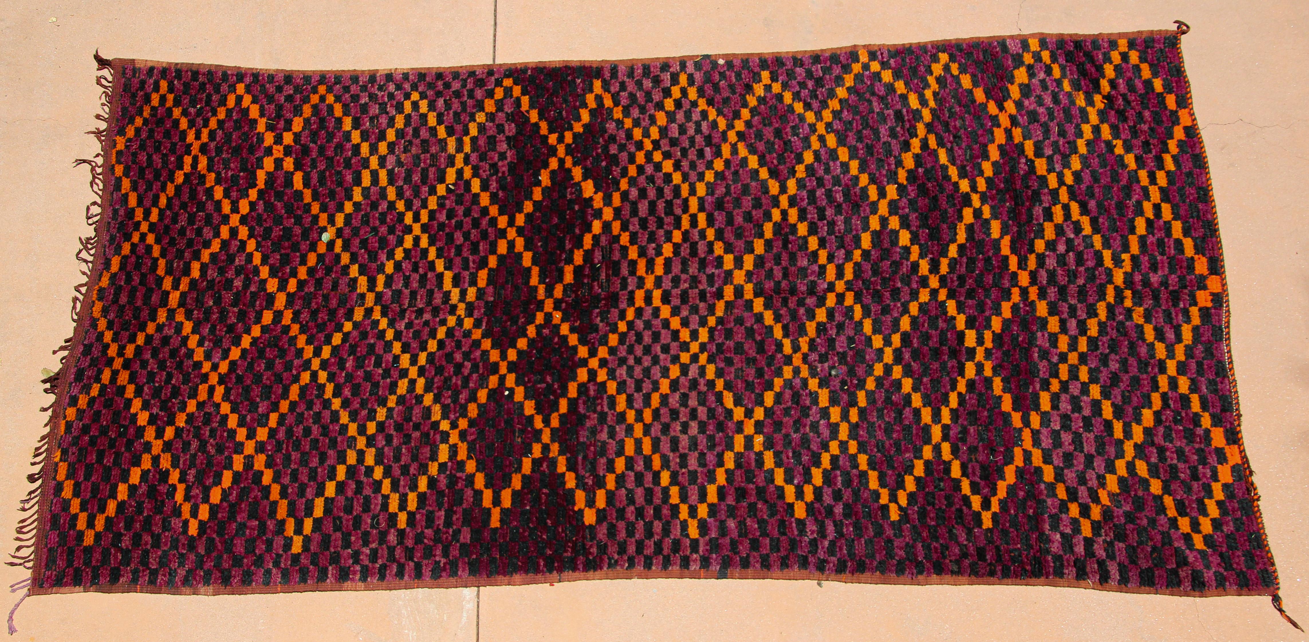 1960s authentic Large vintage Moroccan rug, hand-woven. Wonderf work of Art, purples hues geometrical losanges design. Great hand-woven vintage clector Moroccan runner.Great hand woven vintage lush Moroccan rug, purple, orange and black. Unique and