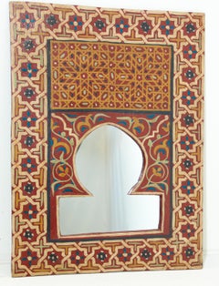 Miroir marocain vintage peint à la main avec des motifs mauresques rouges et ambrés