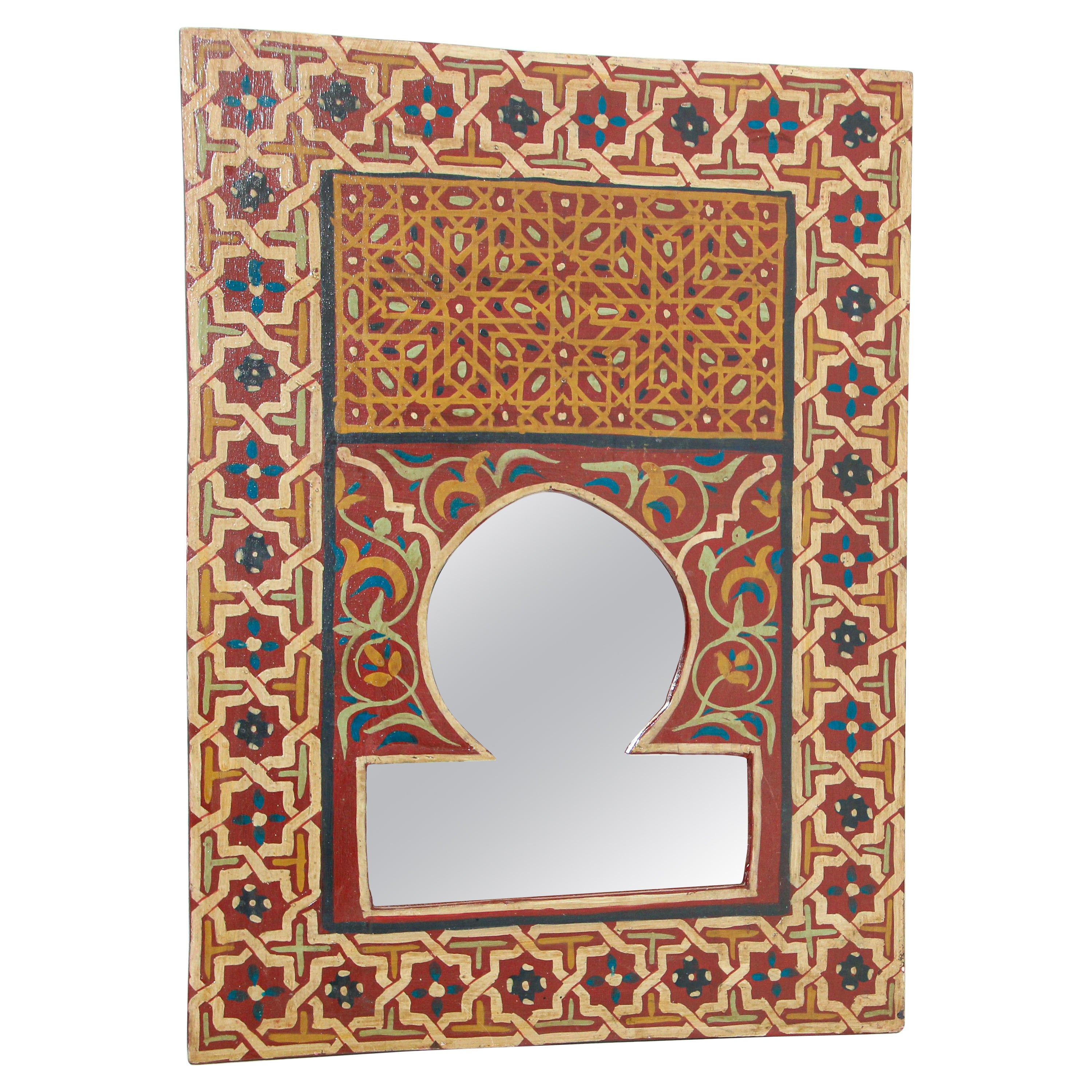 Miroir marocain vintage peint à la main avec des motifs mauresques rouges et ambrés