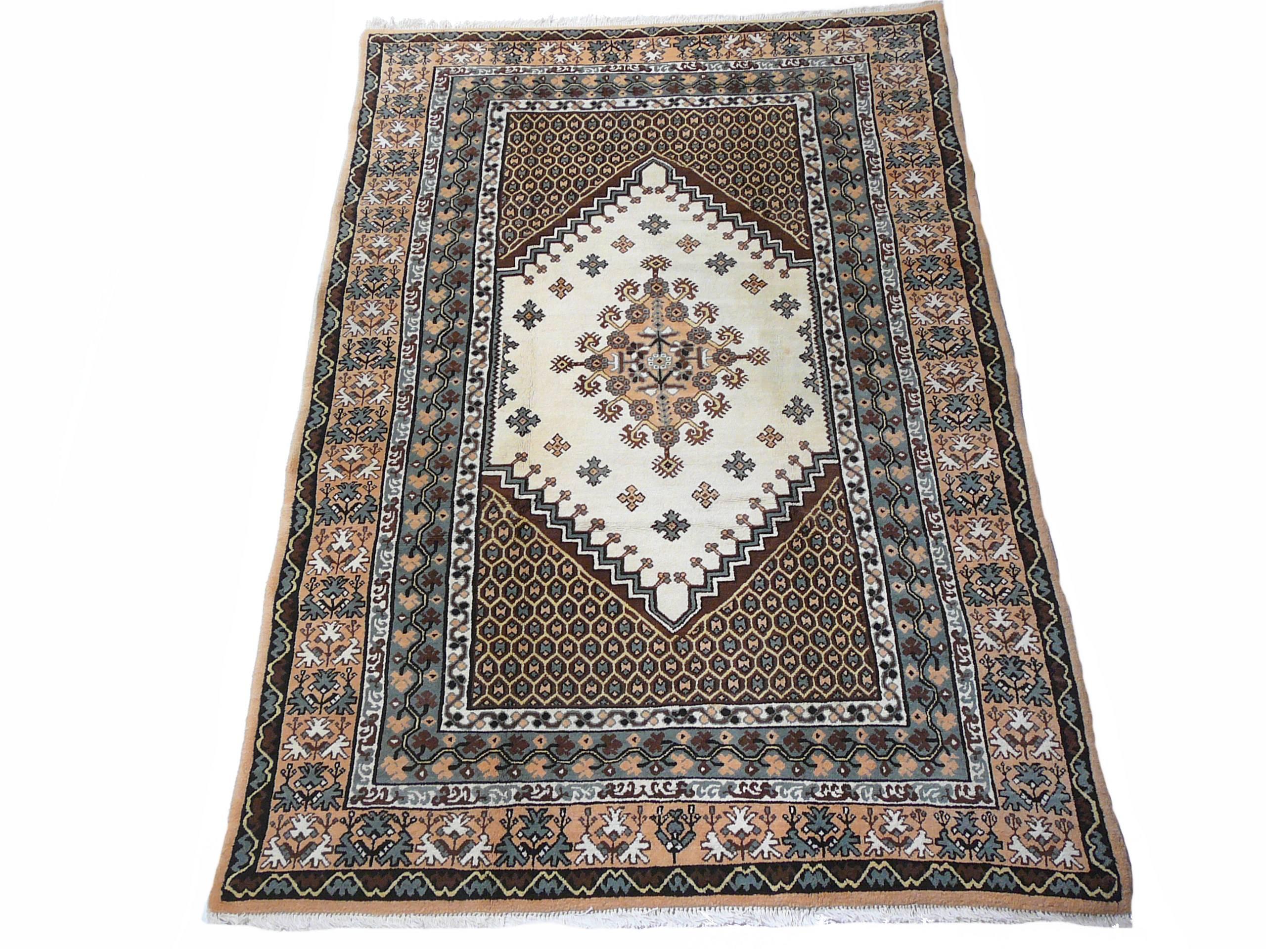 Very fine handknotted North african Rabat Berber rug. Great condition, well kept. Unusual Color combination with creme, beiges and grey.

The Djoharian Design Collection is located in Germany, all our rugs are shipped from there. We are licensed