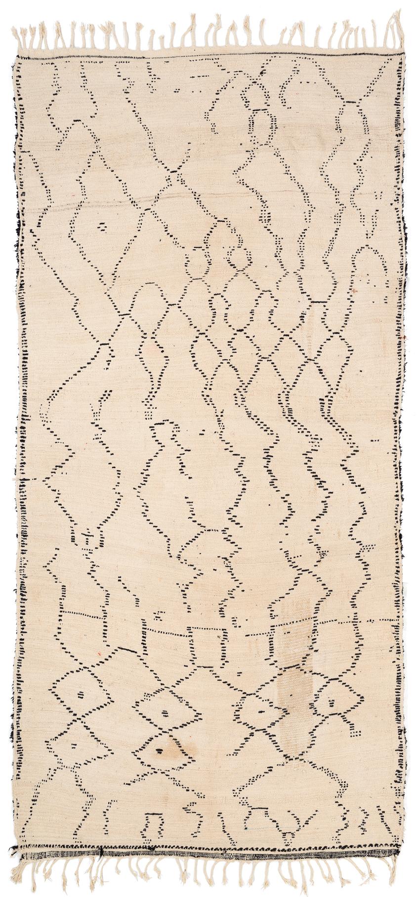 This Moroccan is an Azilal with an unusually good structure. It is not as loosely knotted like most other Azilals. The rug features a great design with a graphic, abstract pattern. It is from the central High Atlas from the 1980s and is in perfect