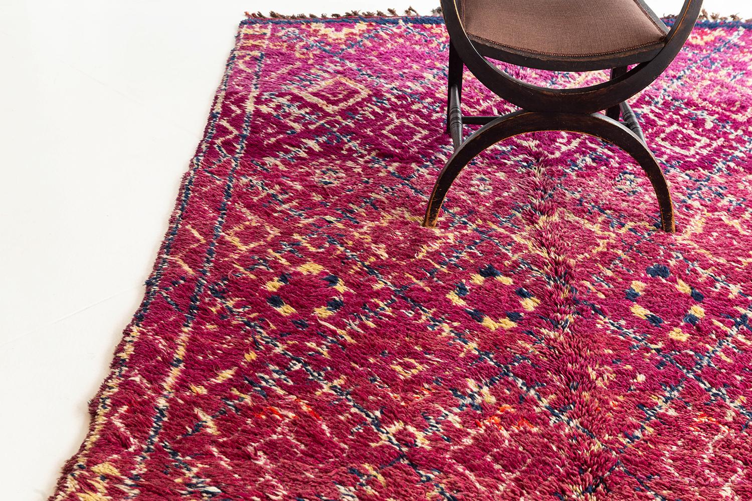 A beautiful vintage Azilal that tells its story through the use of bold and captivating purple, red, and yellow colors. This handwoven Moroccan contains intricate designs and symbolic patterns that brings character to any space. 


Rug number:
