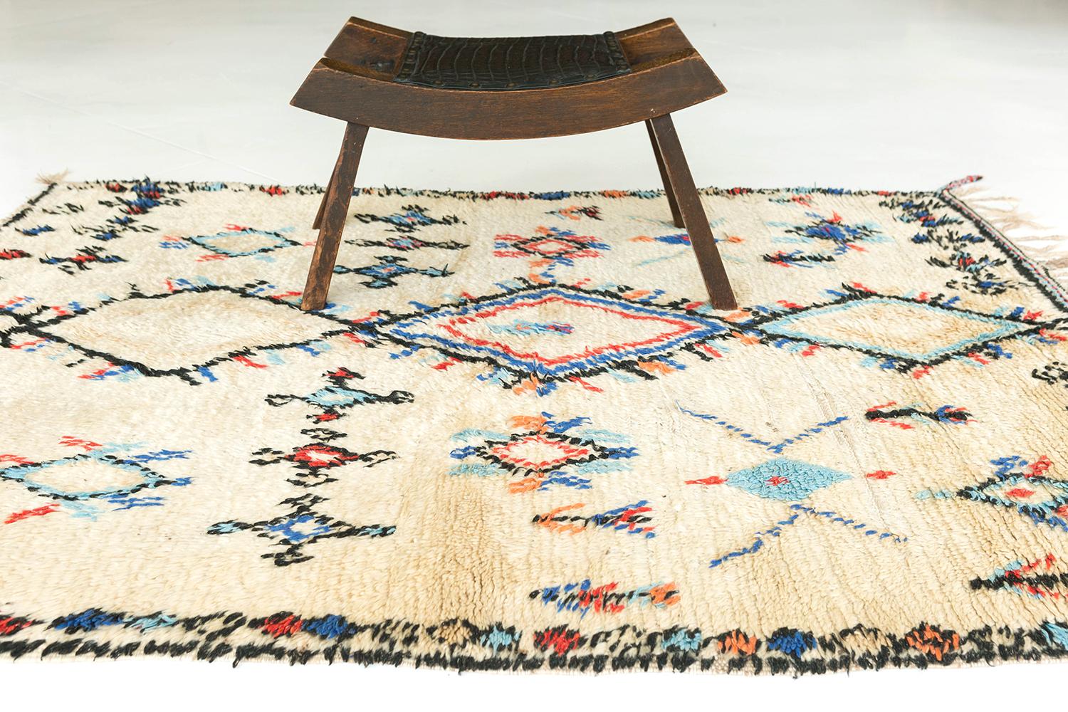 Featuring a series of all over variations of lozenge, this Vintage Moroccan Azilal Tribe rug in Atlas collection is a refreshing piece that you should not miss! Spreading around the plush and textured ivory field, this work of art features the