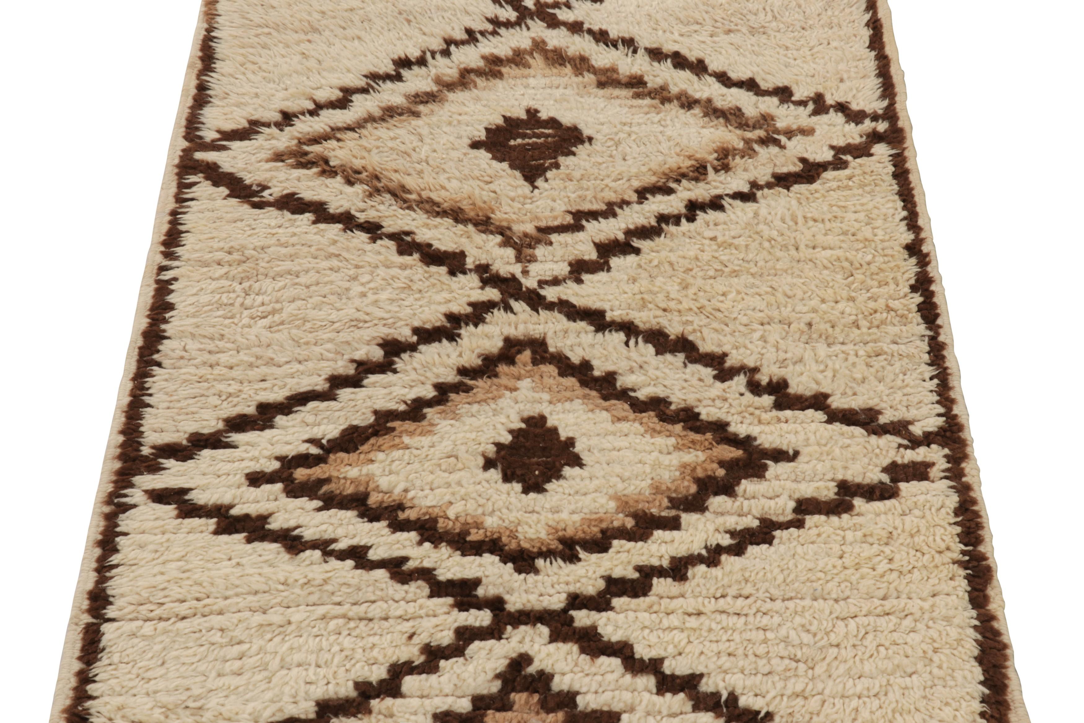 This vintage 3x5 Moroccan rug is the latest grand entry to Rug & Kilim’s curation of iconic tribal pieces. Hand-knotted in wool circa 1950-1960.

On the Design: 

This vintage Moroccan rug exudes understated elegance through its minimal, geometric