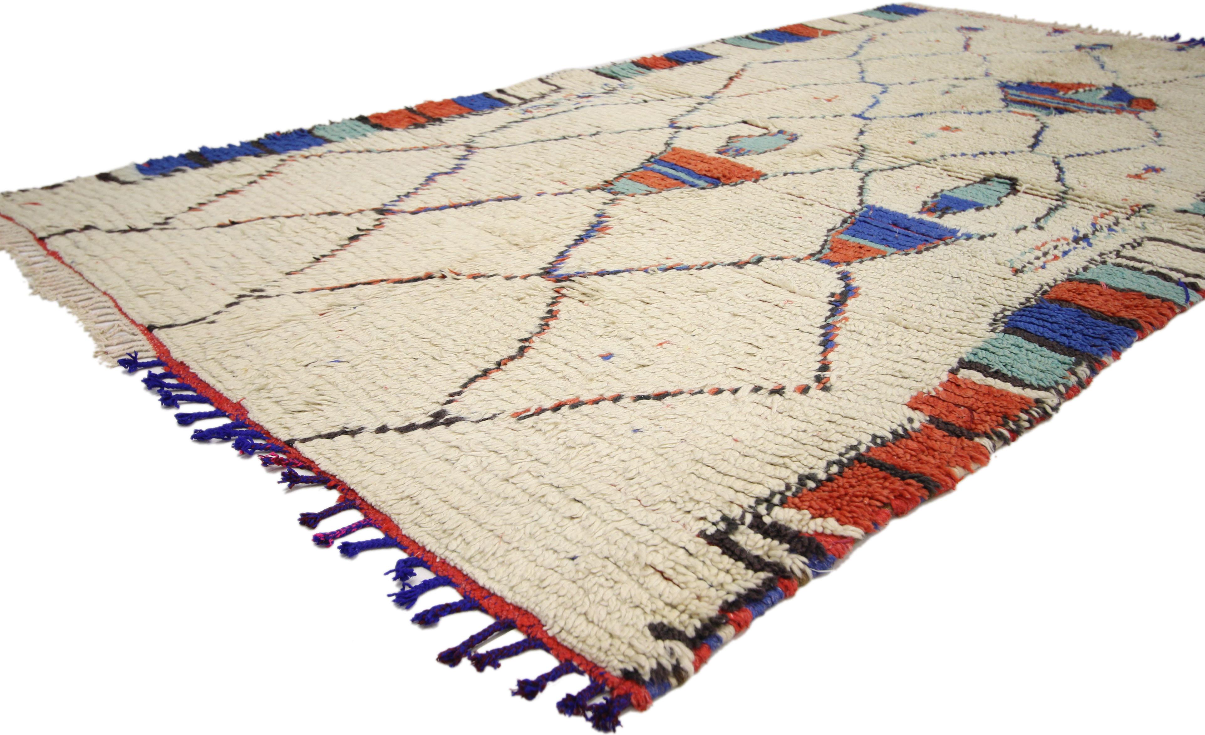 74433 Vintage Moroccan Rug, Berber Moroccan Azilal Tribal Rug. Transform nearly any room into a Moroccan delight with this hand-knotted wool vintage Moroccan rug. Rendered in variegated shades of red, blue, teal and persimmon on a field of