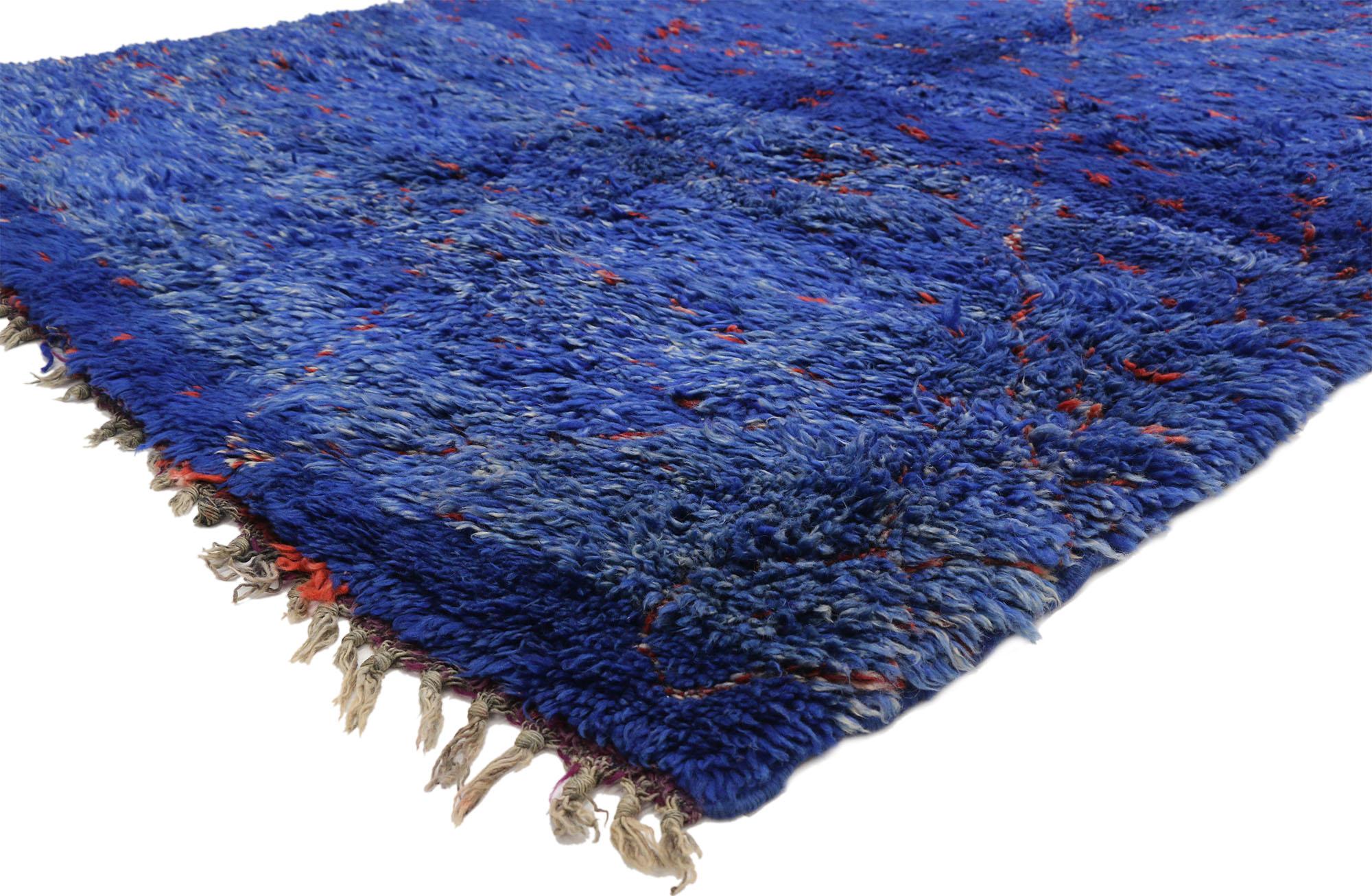 20853, vintage Moroccan rug, Blue Indigo Moroccan Beni Ourain rug. This hand knotted wool vintage blue indigo Beni Ouarain Moroccan rug features an all-over diamond lattice pattern spread across the abrashed royal blue field. The red and ivory lines