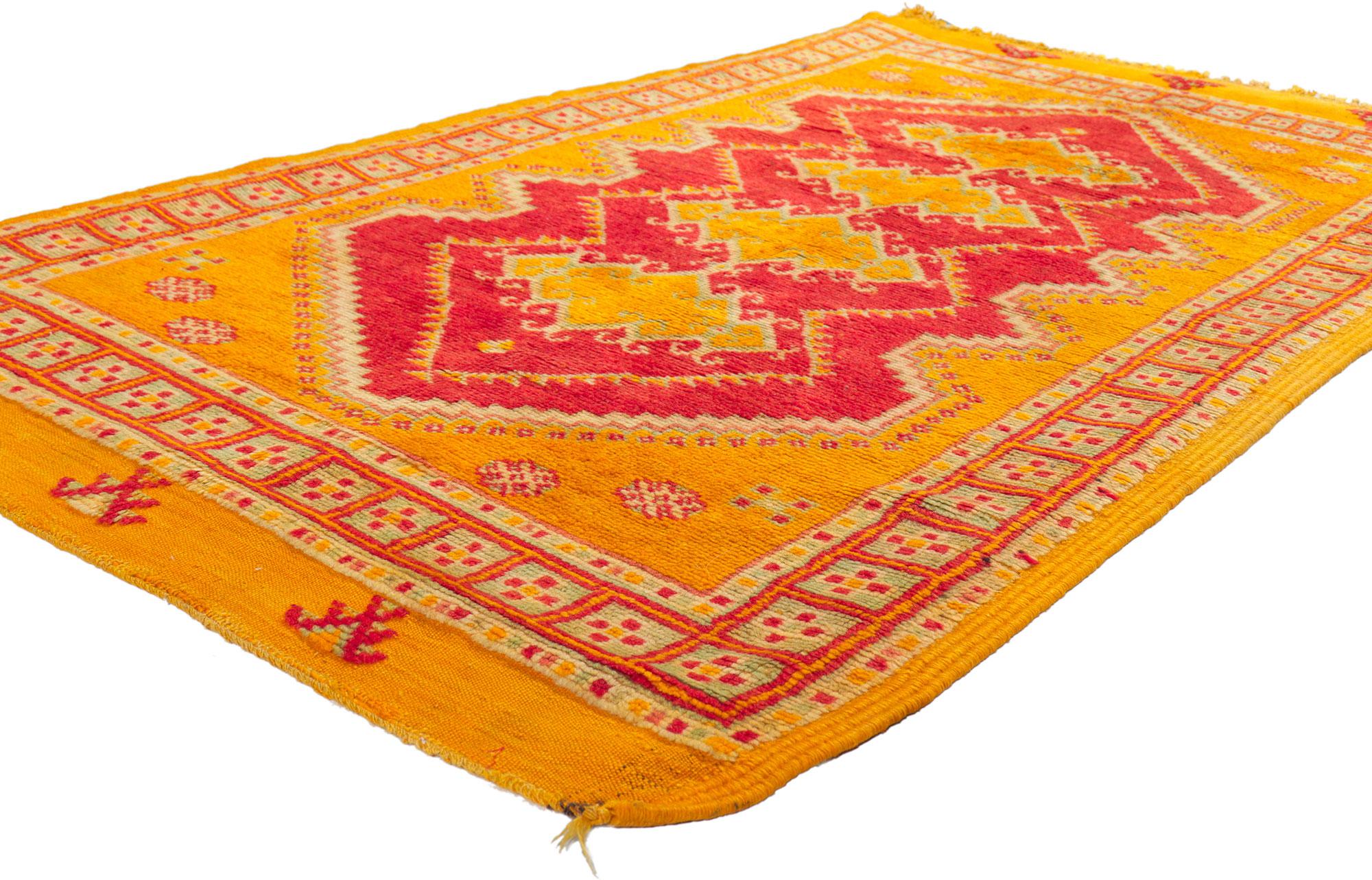 74570 Vintage Berber Moroccan Rug, 03’08 x 06’0. 
The Stark shades of yellow, orange and red woven into this piece work together to create a truly unique look. The variegated design pattern conjures the tribal feeling of Moroccan spirit in this