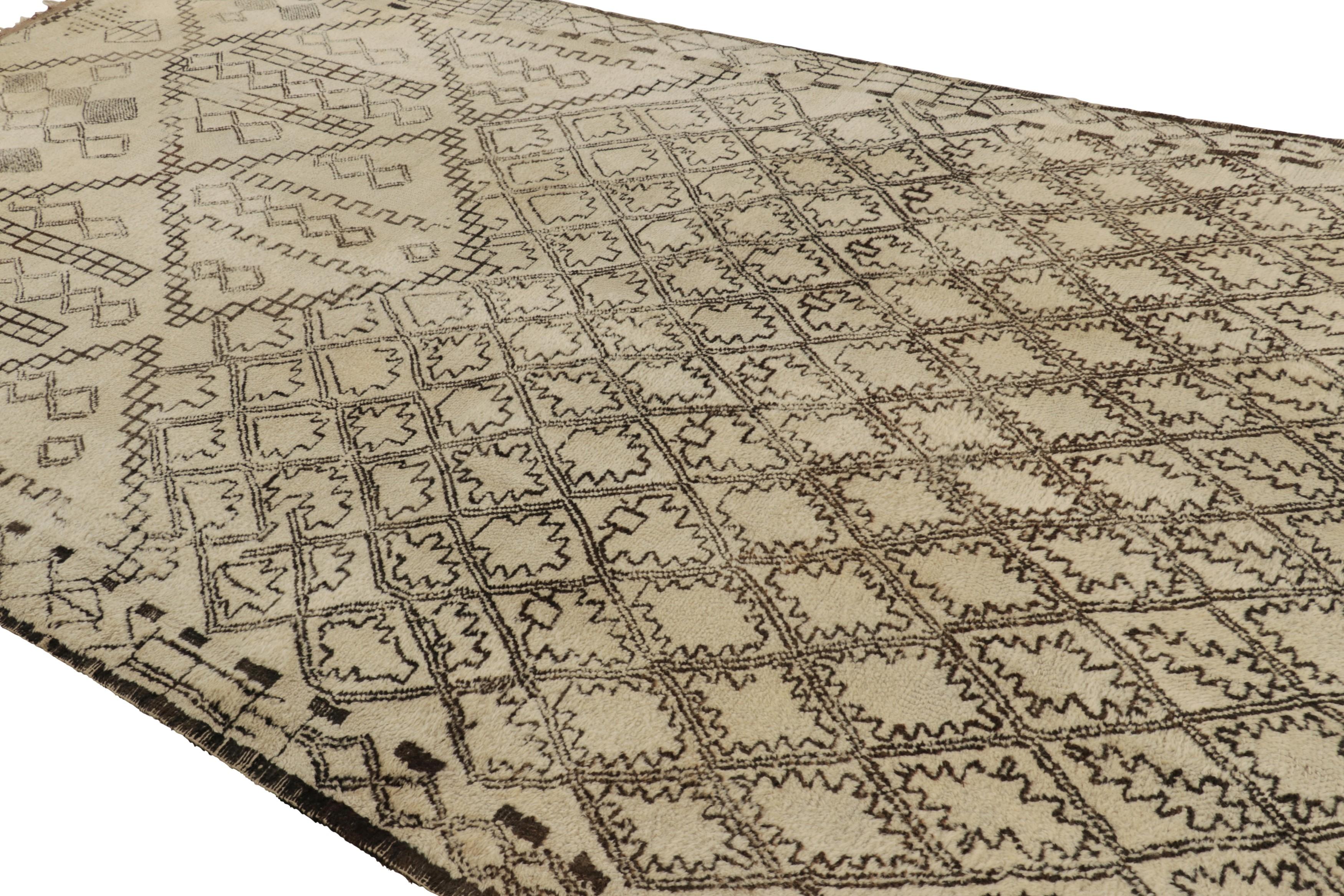 Hand-knotted in wool and originating from Morocco circa 1950-1960, this 7x13 vintage rug is among the most exciting new additions to Rug & Kilim’s mid-century curations from the region. 

On the Design: 

Admirers of the craft will note what an