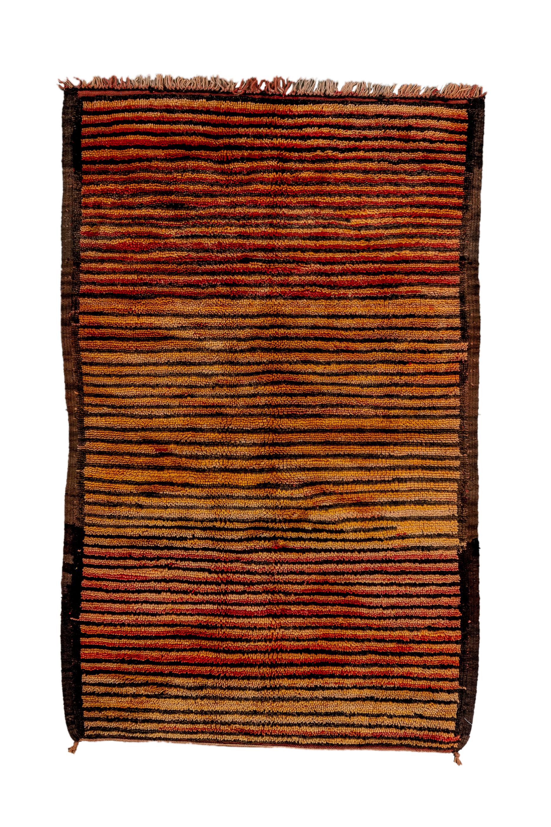 This rustic coarsely woven, all wool, North African scatter shows a horizontal stripe design in goldenrod/beige and dark brown, within broken, narrow, plain dark umber borders. Good condition.
 