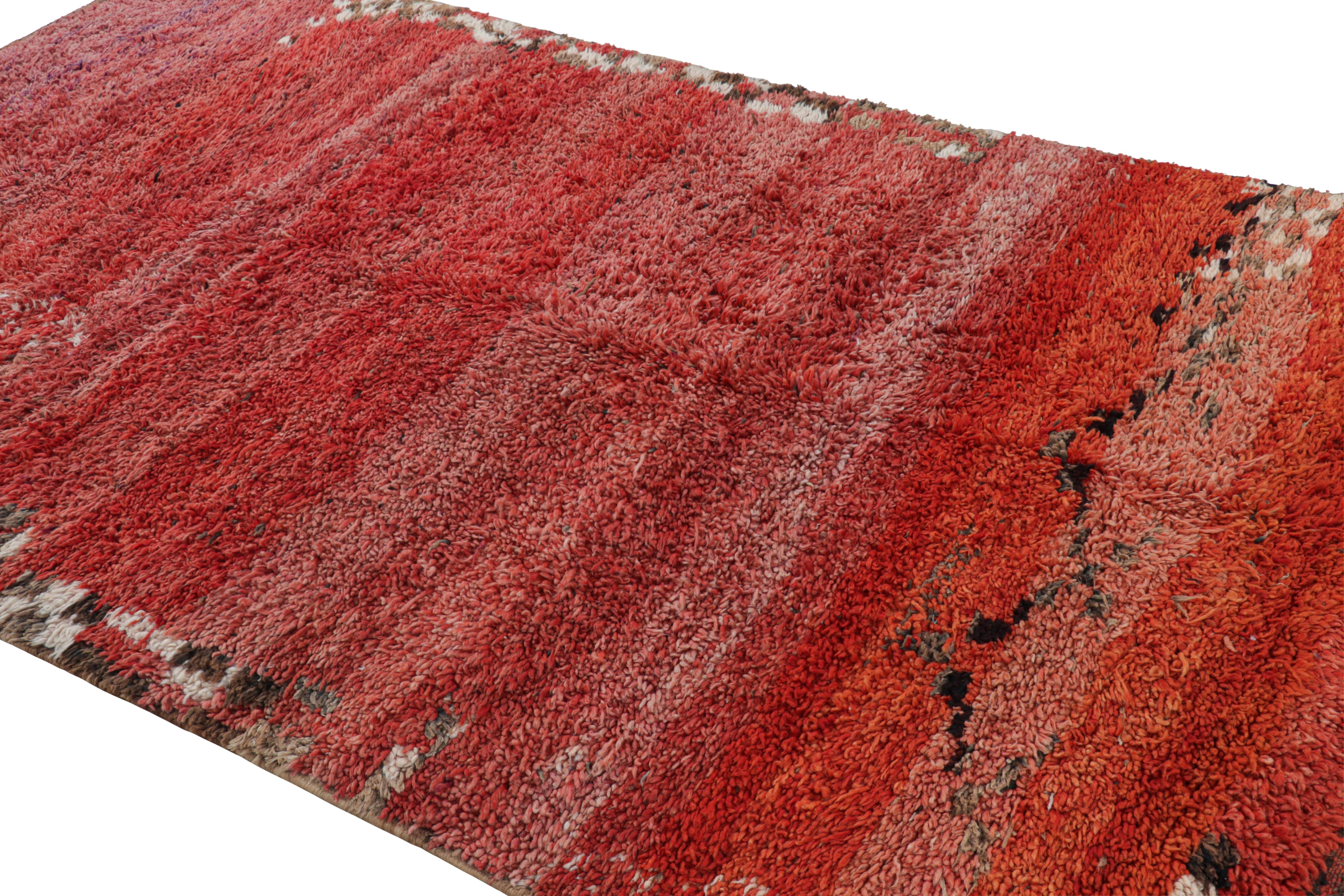 Hand-knotted in wool and originating from Morocco circa 1950-1960, this 6x10 vintage Moroccan rug is an extremely rare piece like so few of its provenance. 

On the Design: 

Admirers of the craft will note what an exceptional find this shabby chic