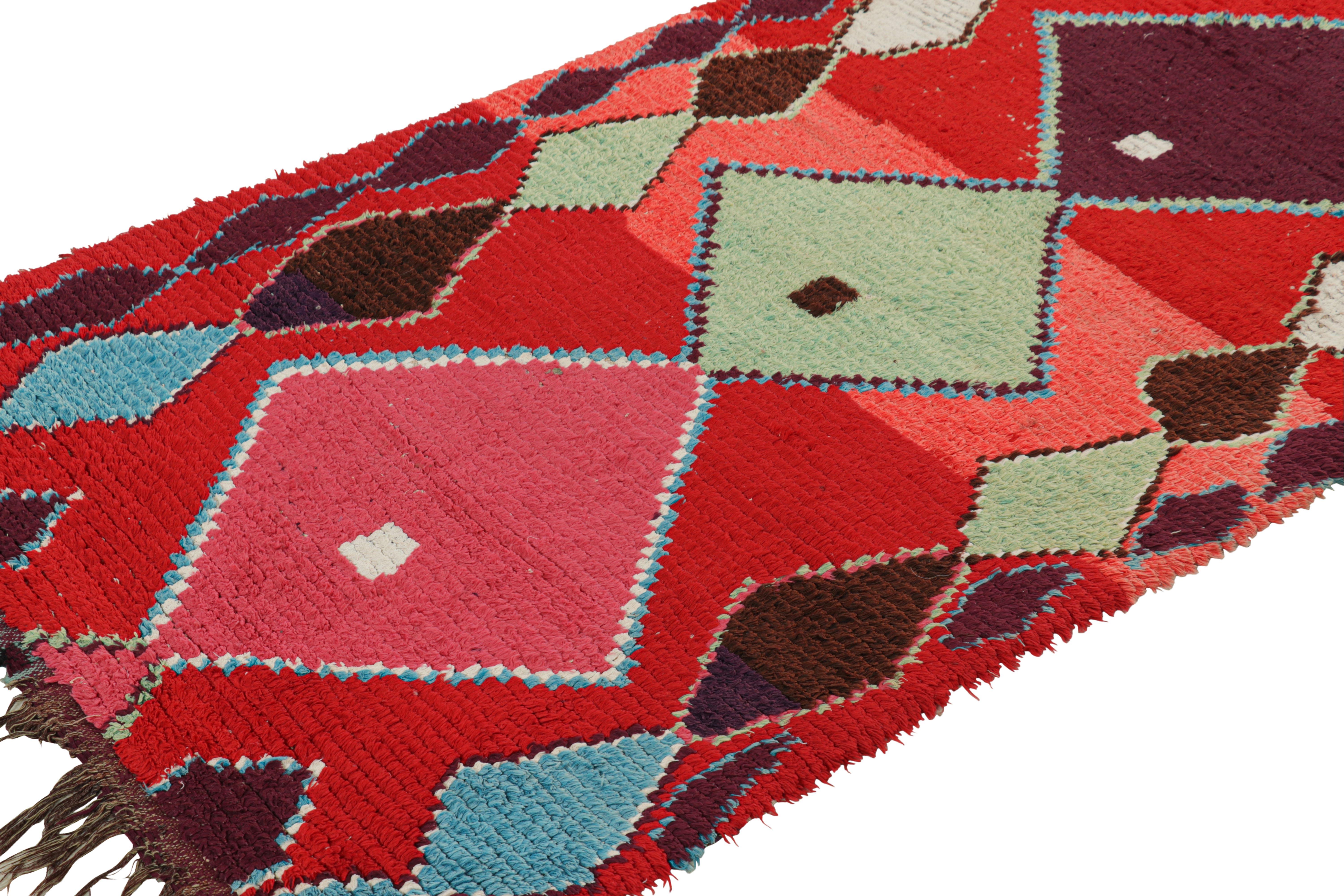 Hand-knotted in wool and originating from Morocco circa 1950-1960, this 3x7 vintage Moroccan rug is an extremely rare piece like so few of its provenance. 

On the Design: 

Admirers of the craft will note what an exceptional find this shabby chic