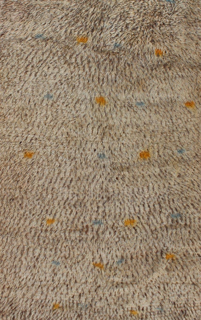Tribal Vintage Moroccan Rug on Taupe Field with Pops of Blue and Yellow For Sale