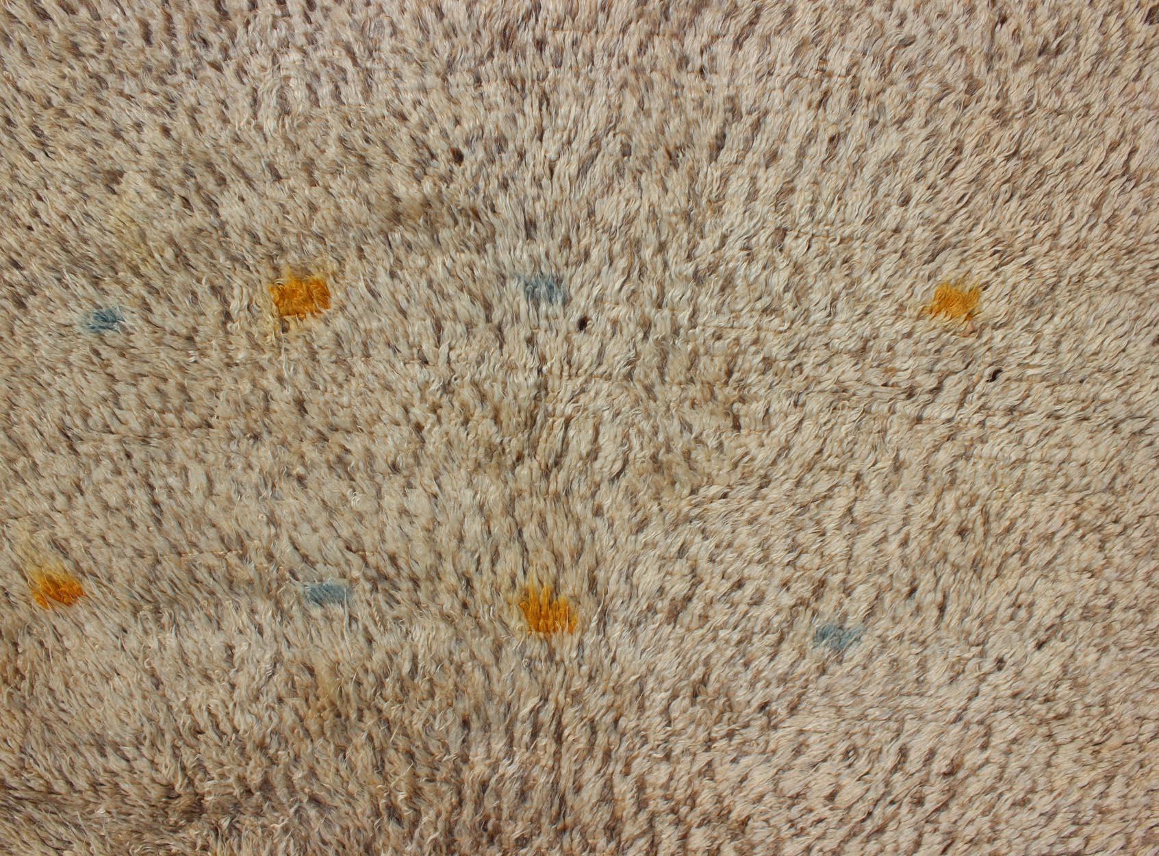 Hand-Knotted Vintage Moroccan Rug on Taupe Field with Pops of Blue and Yellow For Sale