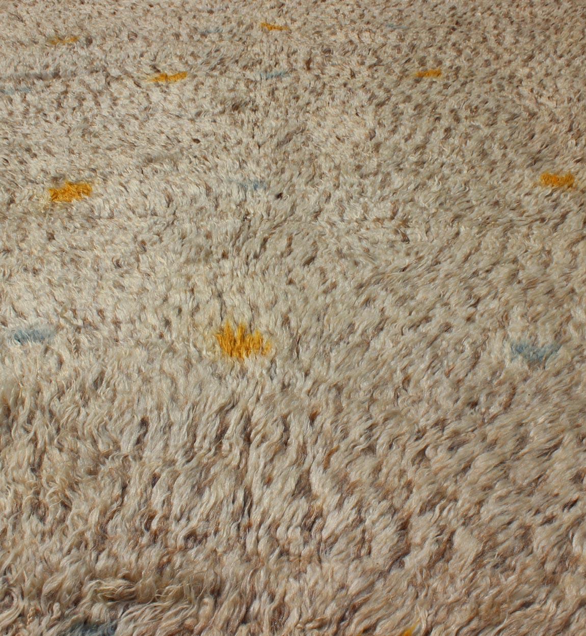 20th Century Vintage Moroccan Rug on Taupe Field with Pops of Blue and Yellow For Sale