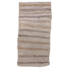 Alfombra marroquí vintage - Sutil diseño de rayas en tonos tierra