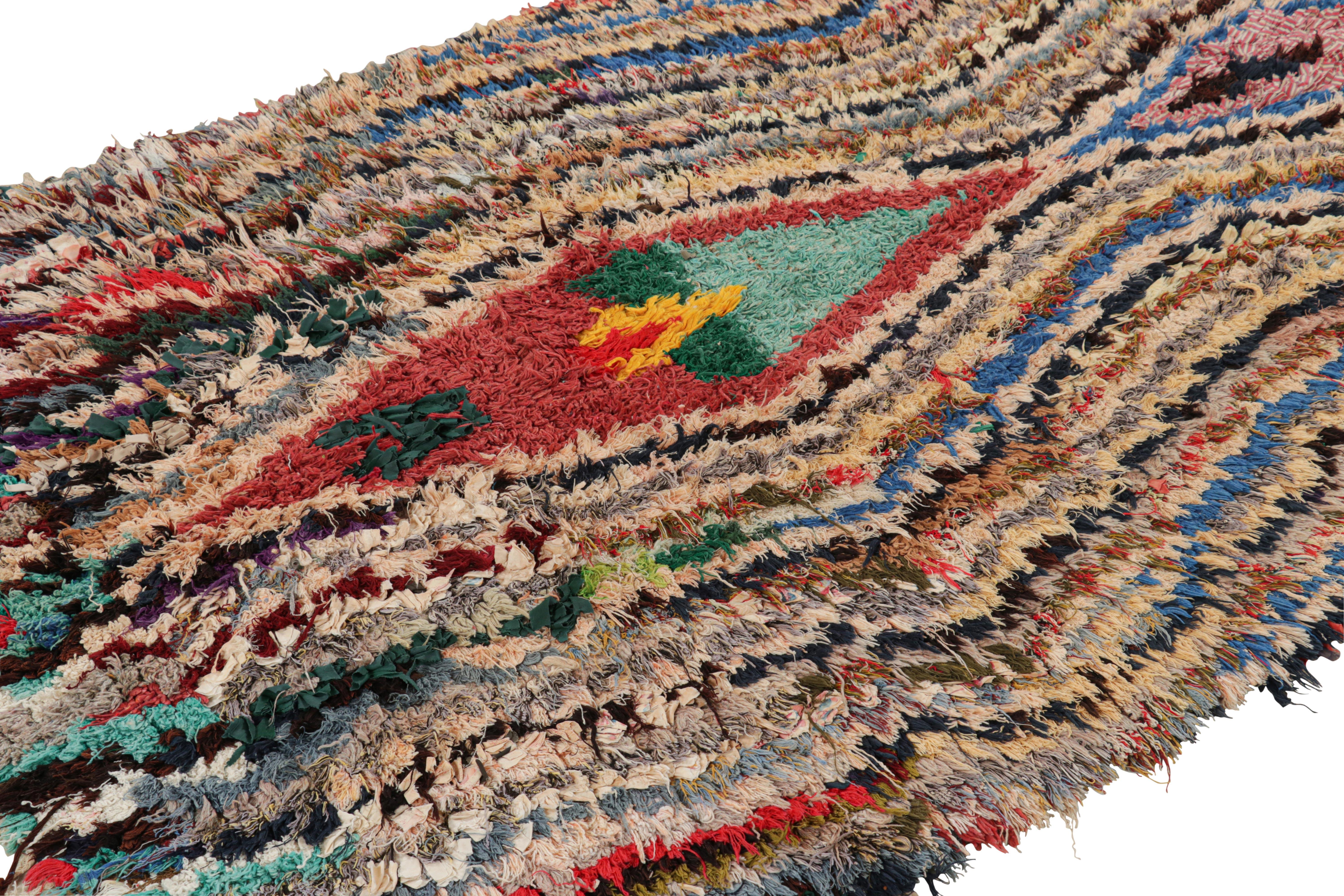 Hand-knotted in wool and originating from Morocco circa 1950-1960, this 5x7 vintage Moroccan rug is an extremely rare piece like so few of its provenance. 

On the Design: 

Admirers of the craft will note what an exceptional find this shabby chic