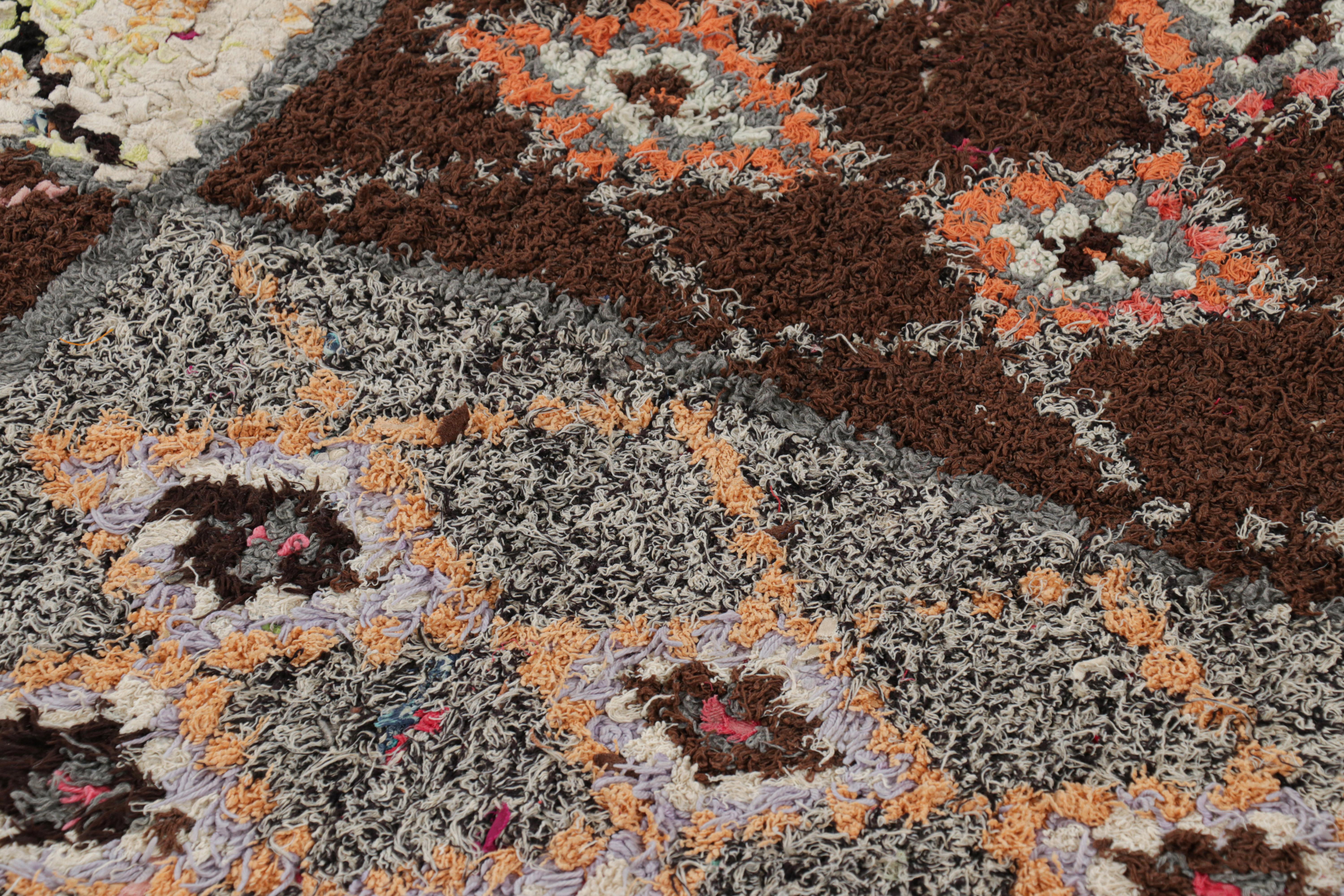 Hand-knotted in wool and originating from Morocco circa 1950-1960, this 3x5 vintage Moroccan rug is an extremely rare piece like so few of its provenance. 

On the Design: 

Admirers of the craft will note what an exceptional find this shabby chic