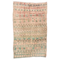 Tapis marocain vintage aux couleurs douces