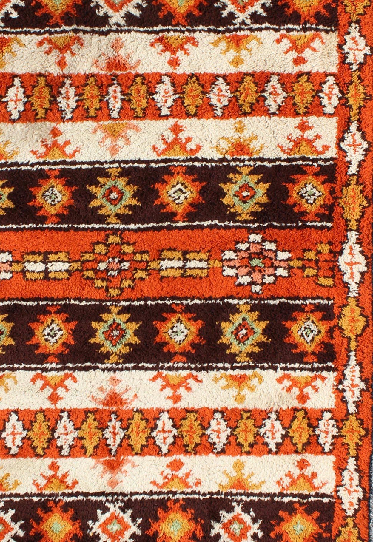 Vintage Moroccan Rug with Stripes & Tribal Design in Orange, D. Brown, Ivory In Good Condition For Sale In Atlanta, GA