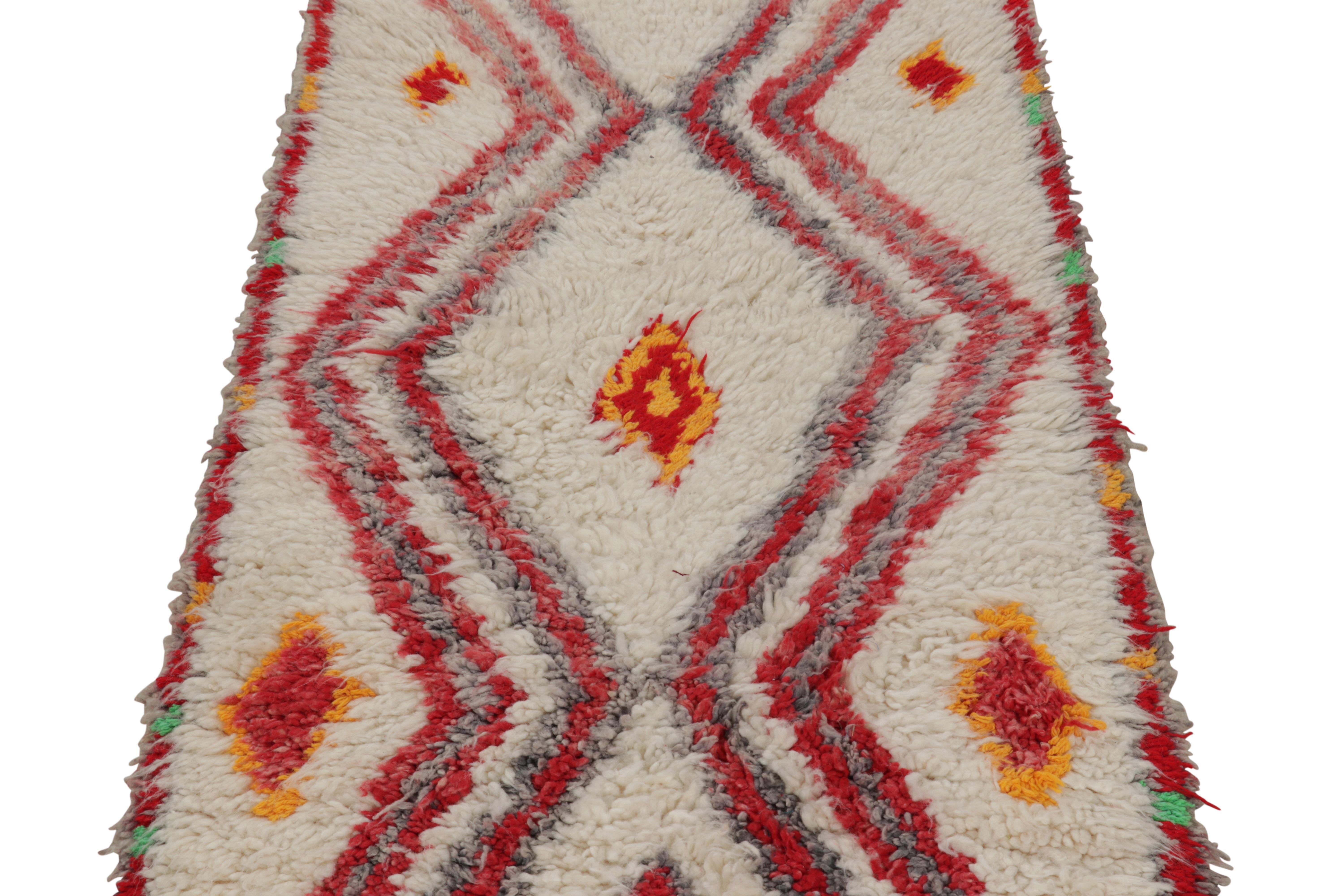 Hand-knotted in wool and originating from Morocco circa 1950-1960, this 3x6 vintage Moroccan rug is an extremely rare piece like so few of its provenance. 

On the Design: 

Admirers of the craft will note what an exceptional find this shabby chic