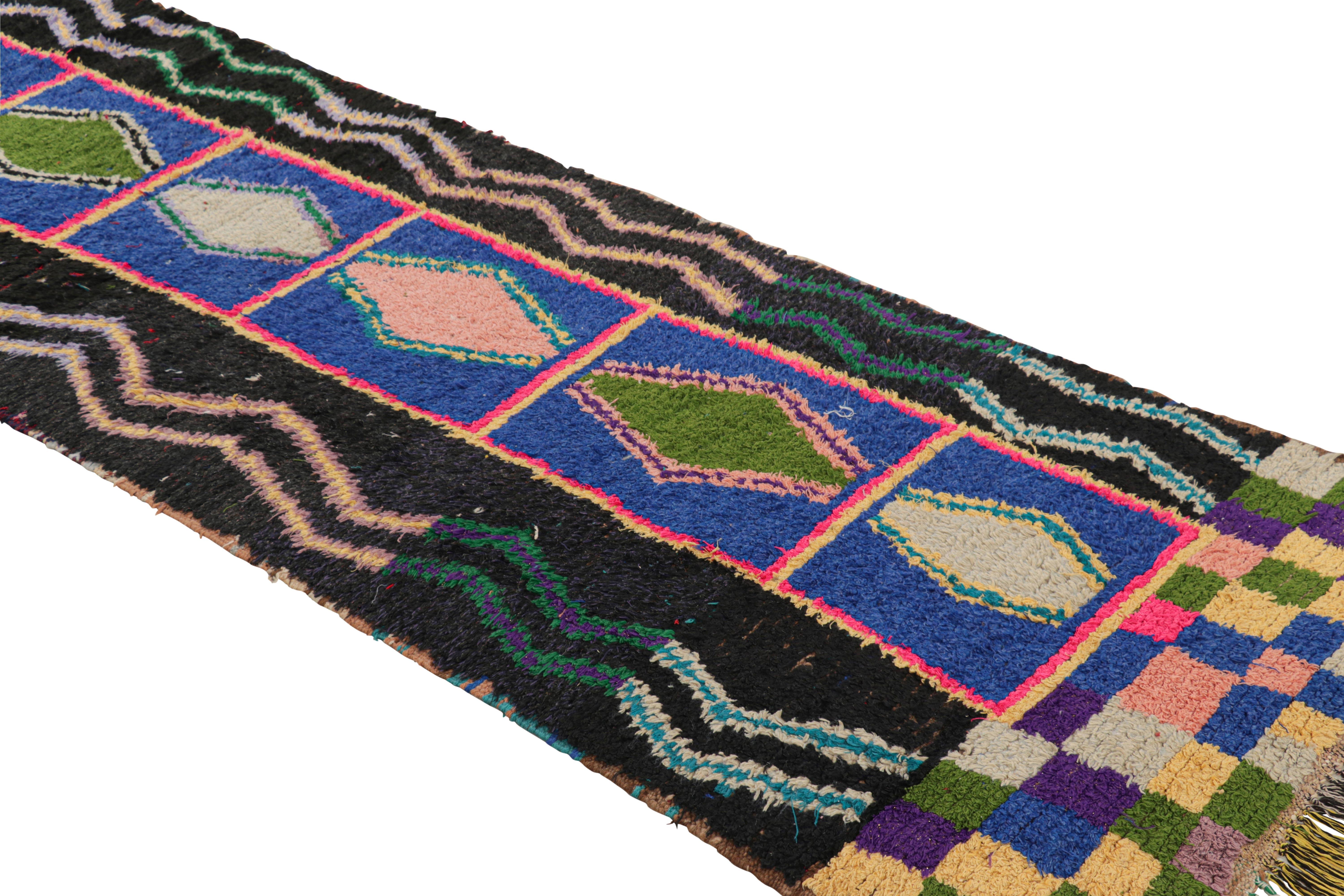 Hand-knotted in wool and originating from Morocco circa 1950-1960, this 3x10 vintage Moroccan rug is an extremely rare piece like so few of its provenance. 

On the Design: 

Admirers of the craft will note what an exceptional find this shabby chic