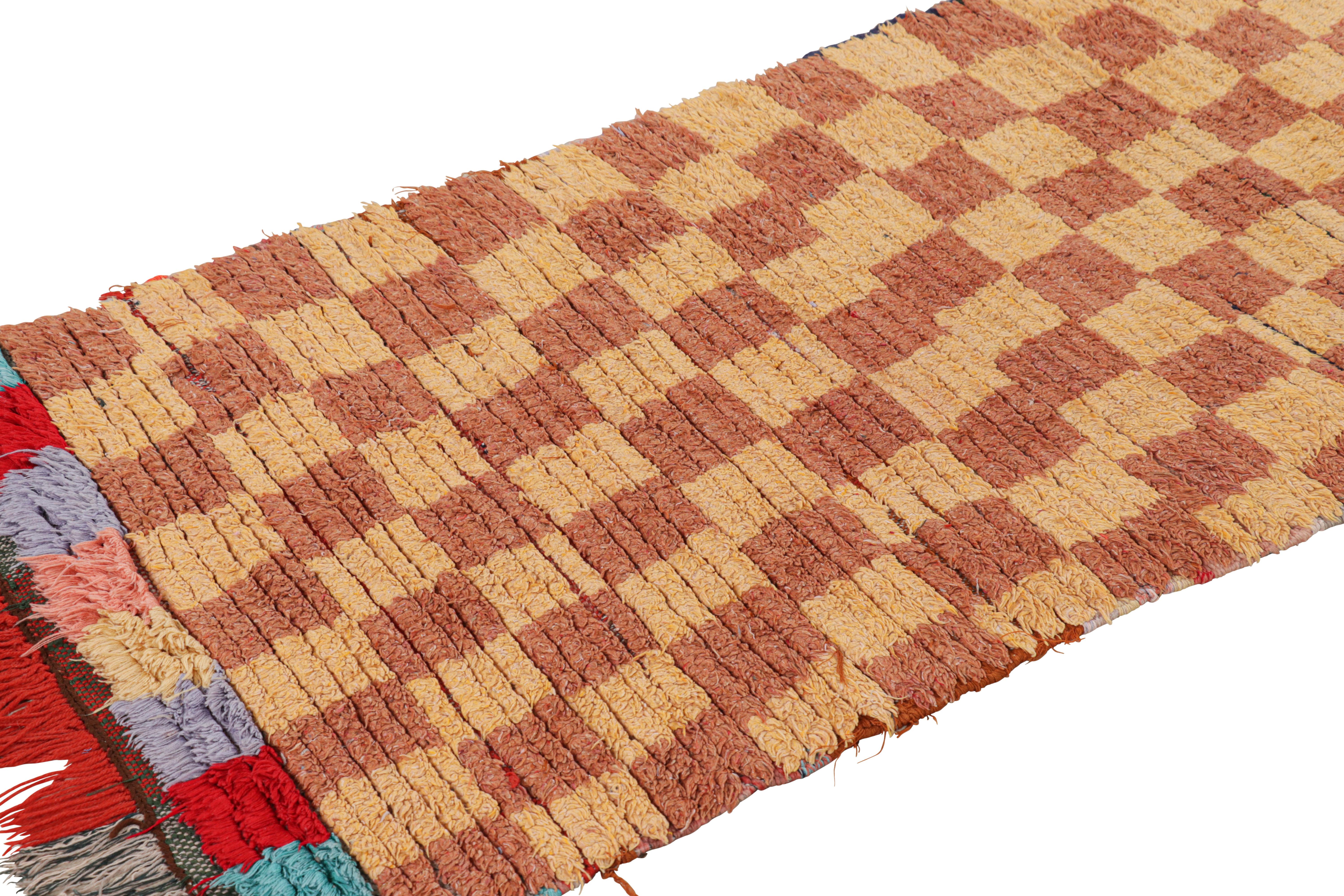 Hand-knotted in wool and originating from Morocco circa 1950-1960, this 2x7 vintage Moroccan runner rug is an exciting new curation from Rug & Kilim’s collection. 

On the Design: 

Geometric patterns in cream yellow and terracotta tones create a