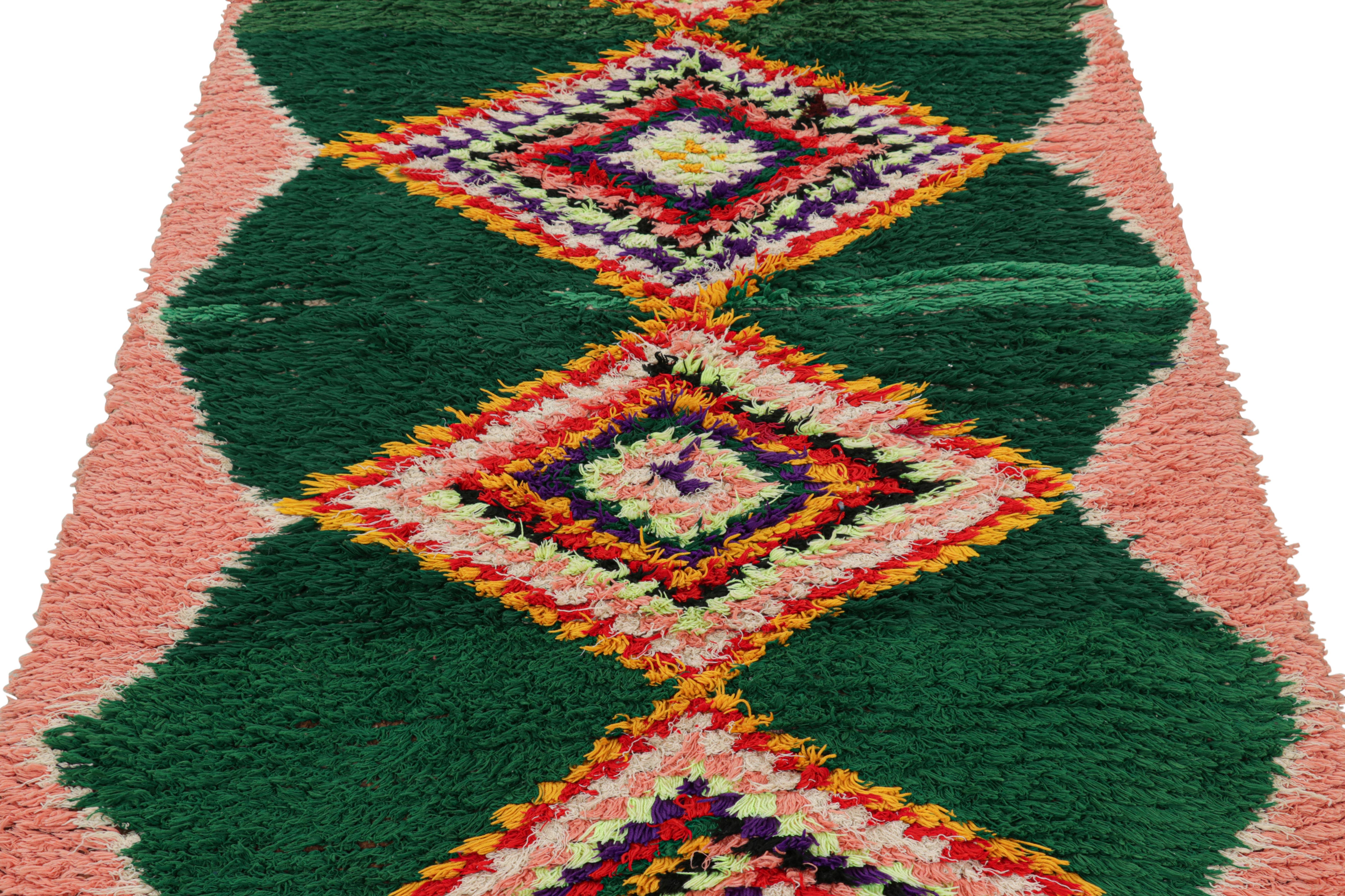 Hand-knotted in wool and originating from Morocco circa 1950-1960, this 4x7 vintage Moroccan rug is an extremely rare piece like so few of its provenance. 

On the Design: 

Admirers of the craft will note what an exceptional find this shabby chic