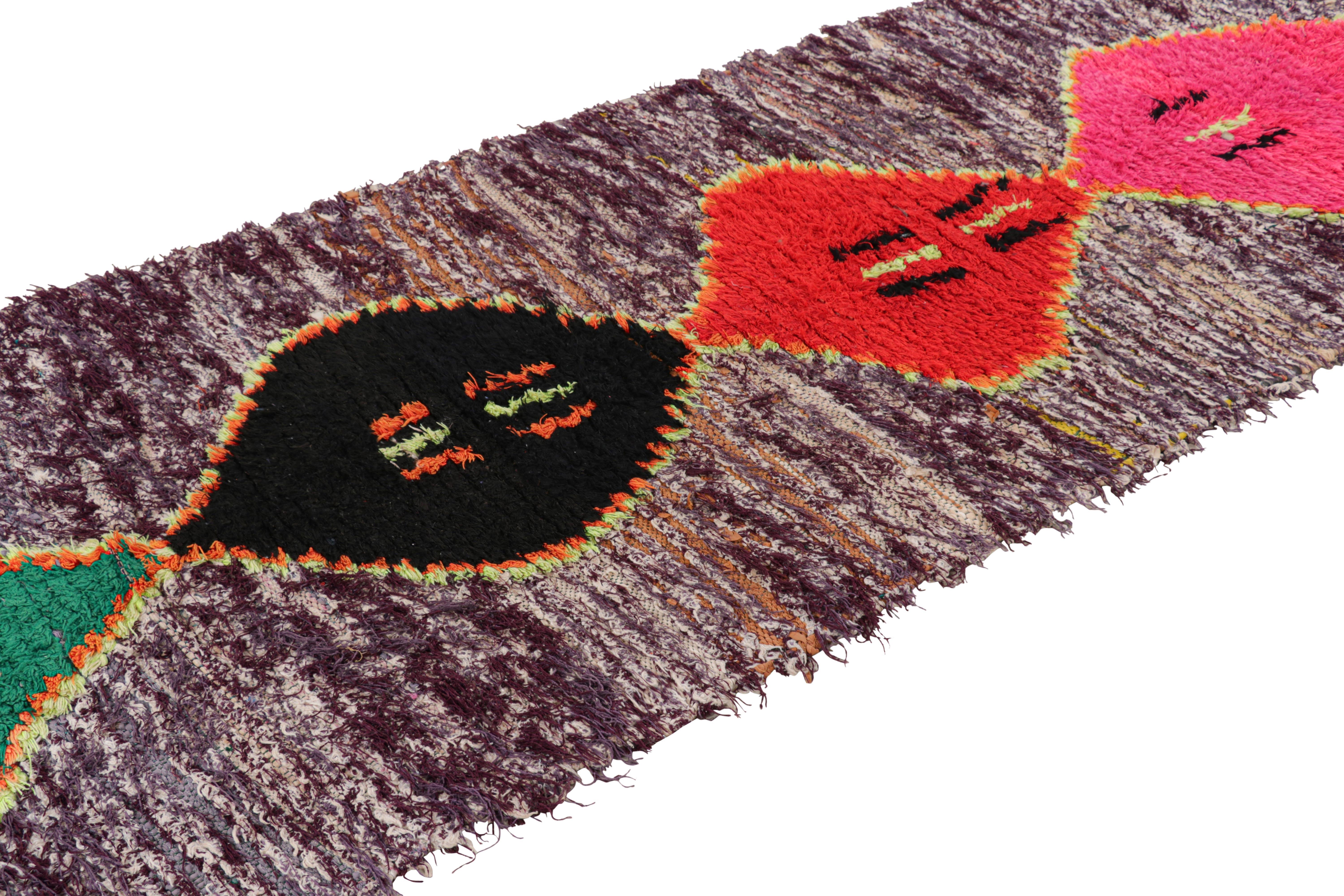 Hand-knotted in wool and originating from Morocco circa 1950-1960, this 4x9 vintage Moroccan rug is an extremely rare piece like so few of its provenance. 

On the Design: 

Admirers of the craft will note what an exceptional find this shabby chic