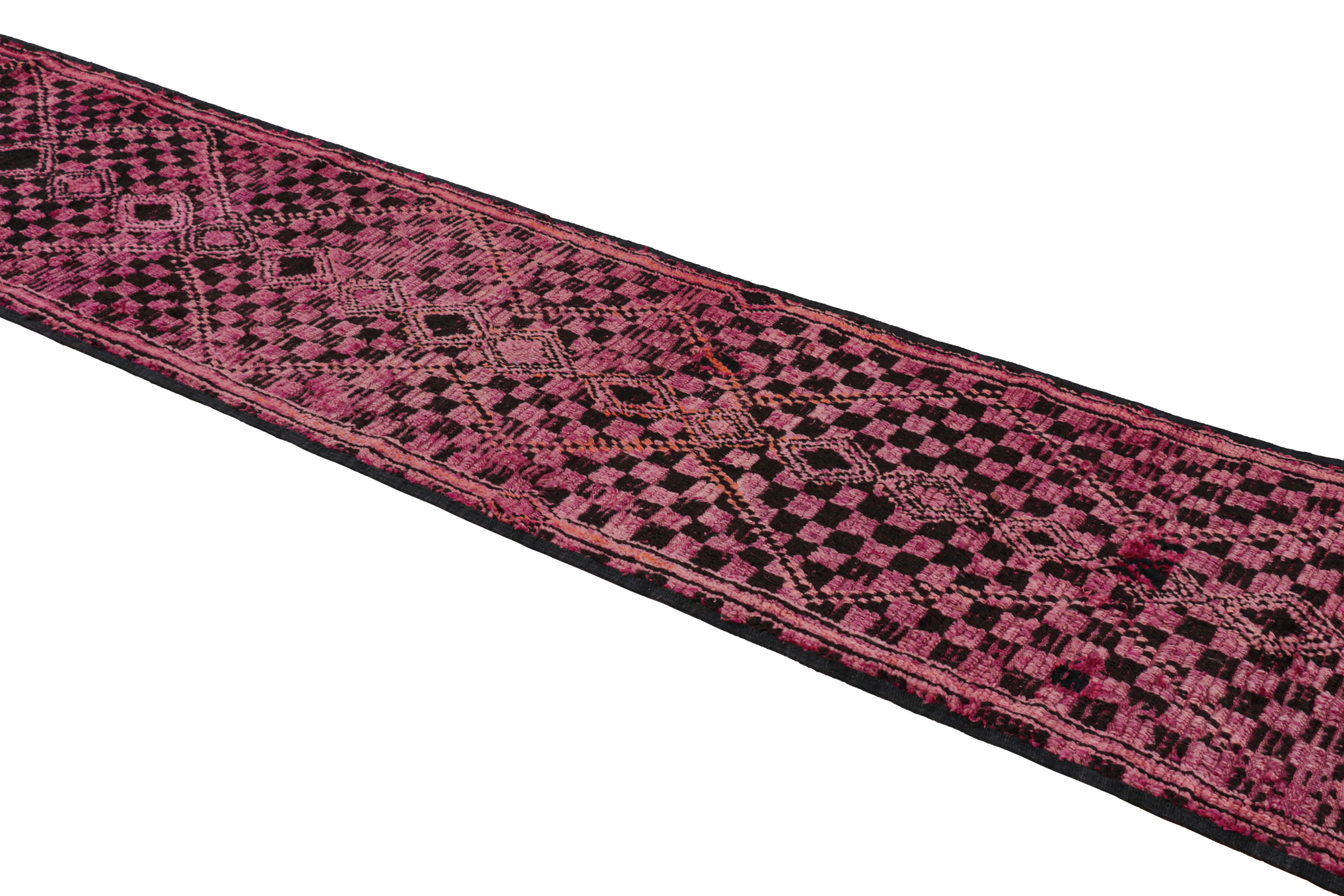 Hand-knotted in wool and originating from Morocco circa 1950-1960, this 3x14 vintage Moroccan rug is an extremely rare piece like so few of its provenance. 

On the Design: 

Admirers of the craft will note what an exceptional find this shabby chic