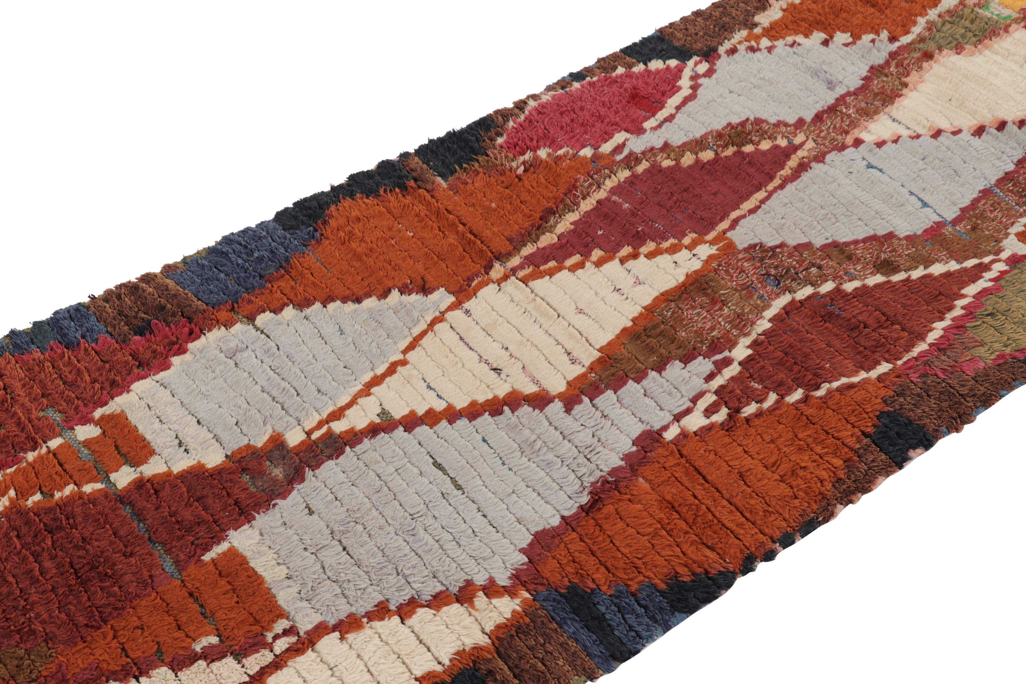 Hand-knotted in wool and originating from Morocco circa 1950-1960, this 3x7 vintage runner rug is a rare and among the most exciting new additions to Rug & Kilim’s mid-century curations from the region.

On the Design: 

This exuberant vintage