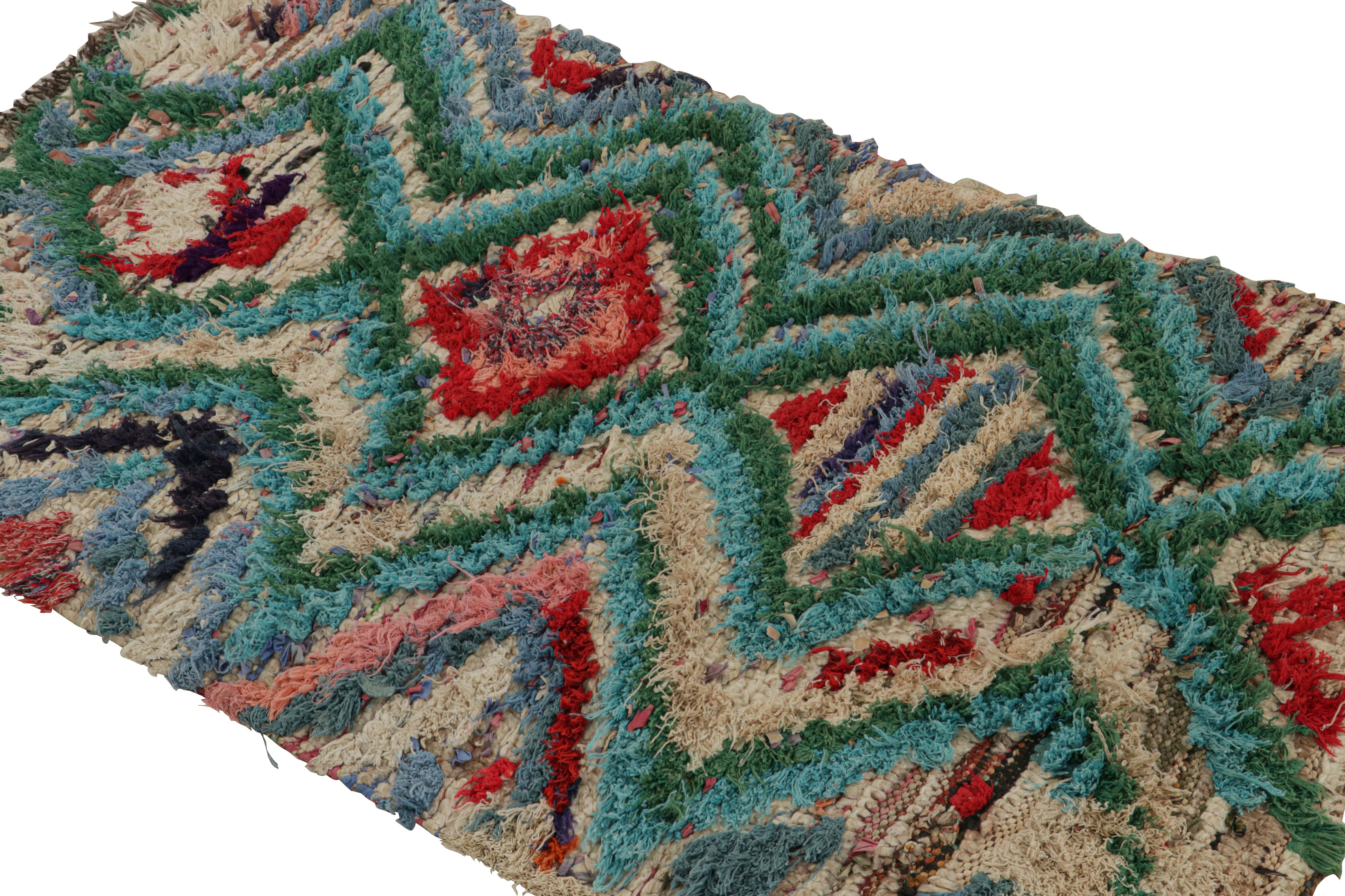 Hand-knotted in wool circa 1950-1960, this 3x7 vintage Moroccan runner rug with polychromatic chevron and diamond geometric patterns, hails from the Azilal tribe.  

On the Design: 

Connoisseurs will further admire this as an exemplary piece of the