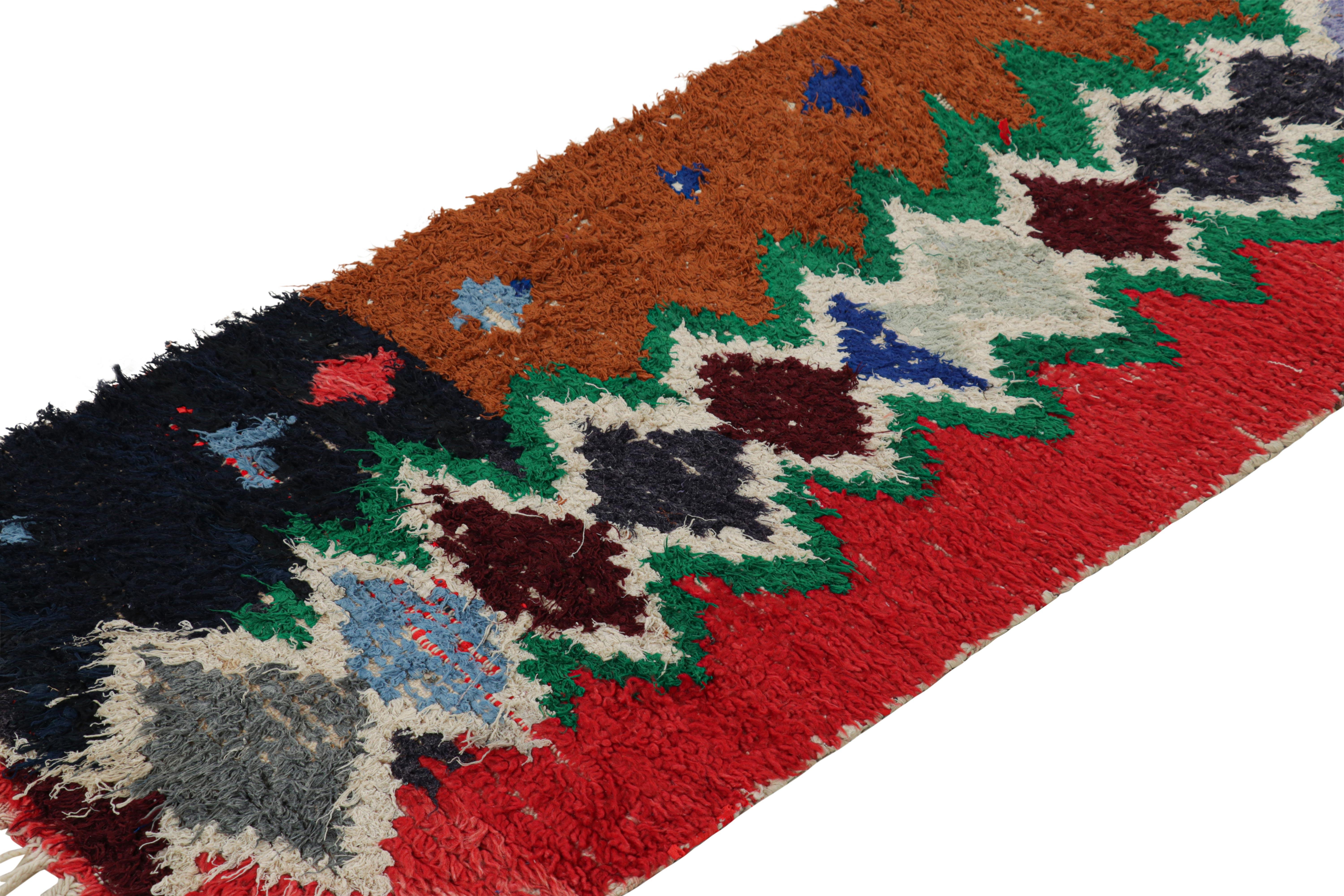 Hand-knotted in wool and originating from Morocco circa 1950-1960, this 2x7 vintage Moroccan rug is an extremely rare piece like so few of its provenance. 

On the Design: 

Admirers of the craft will note what an exceptional find this shabby chic