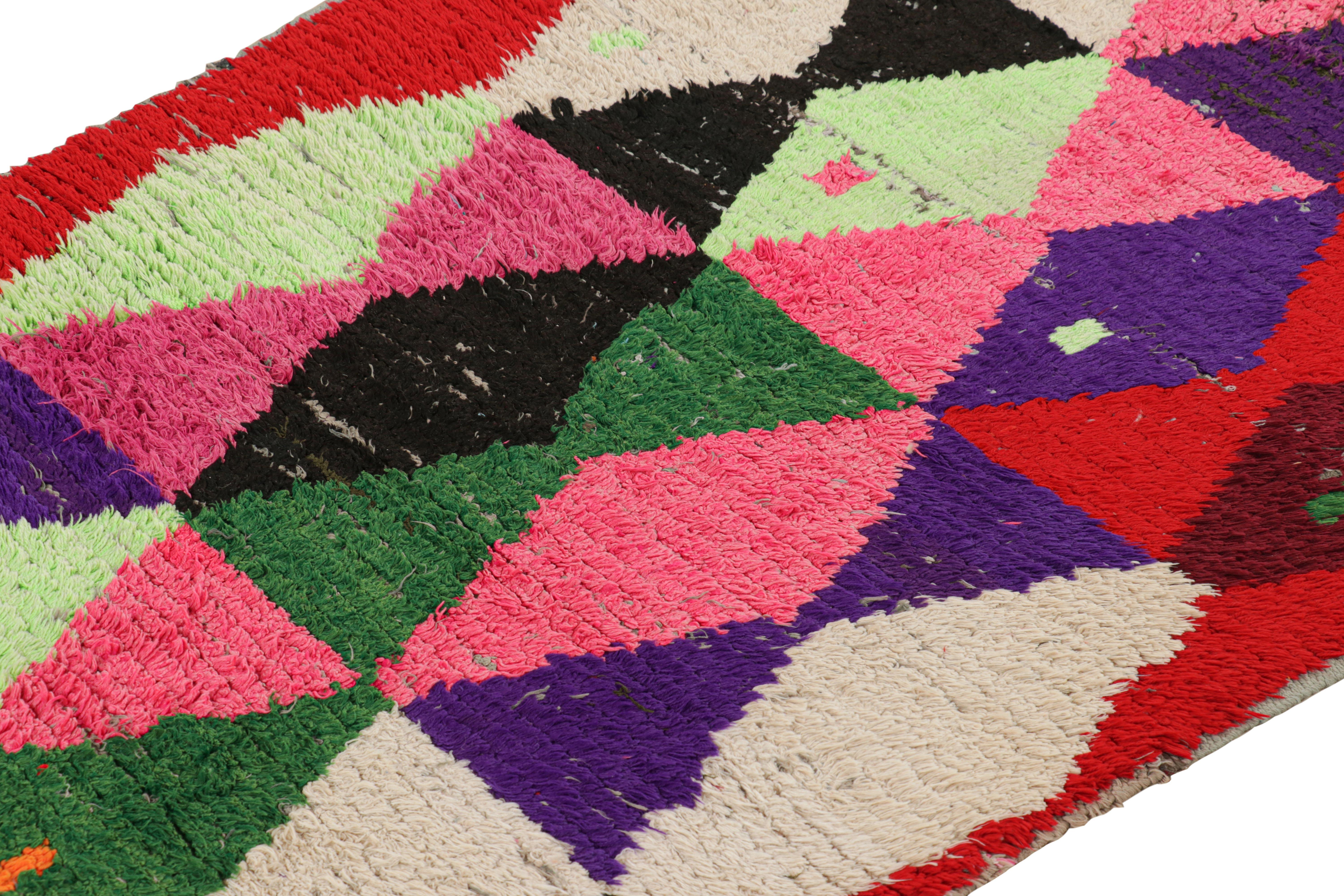 Hand-knotted in wool and originating from Morocco circa 1950-1960, this 3x7 vintage Moroccan rug is an extremely rare piece like so few of its provenance. 

On the Design: 

Admirers of the craft will note what an exceptional find this shabby chic