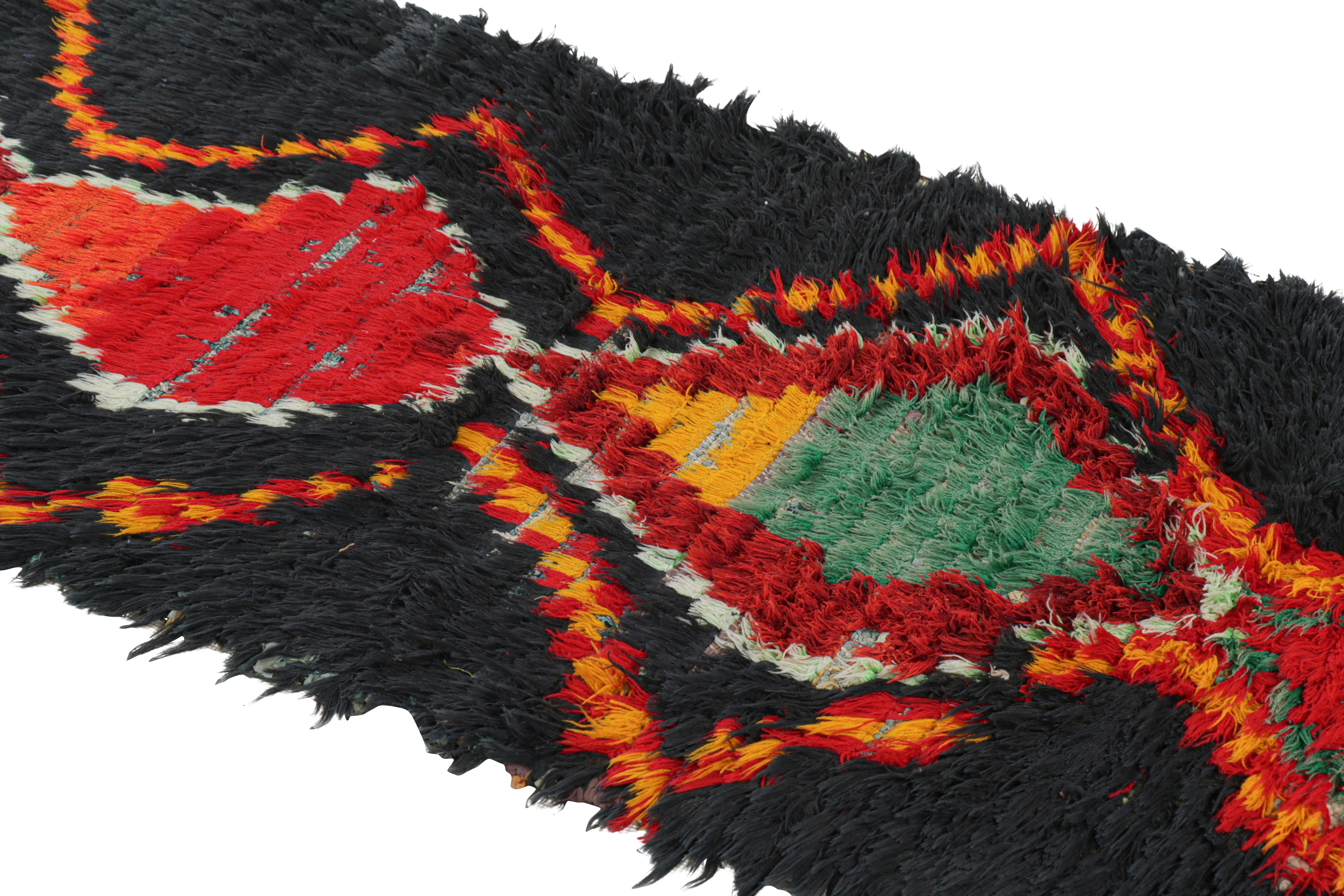 Hand-knotted in wool and originating from Morocco circa 1950-1960, this 2x6 vintage Moroccan rug is an extremely rare piece like so few of its provenance. 

On the Design: 

Admirers of the craft will note what an exceptional find this shabby chic