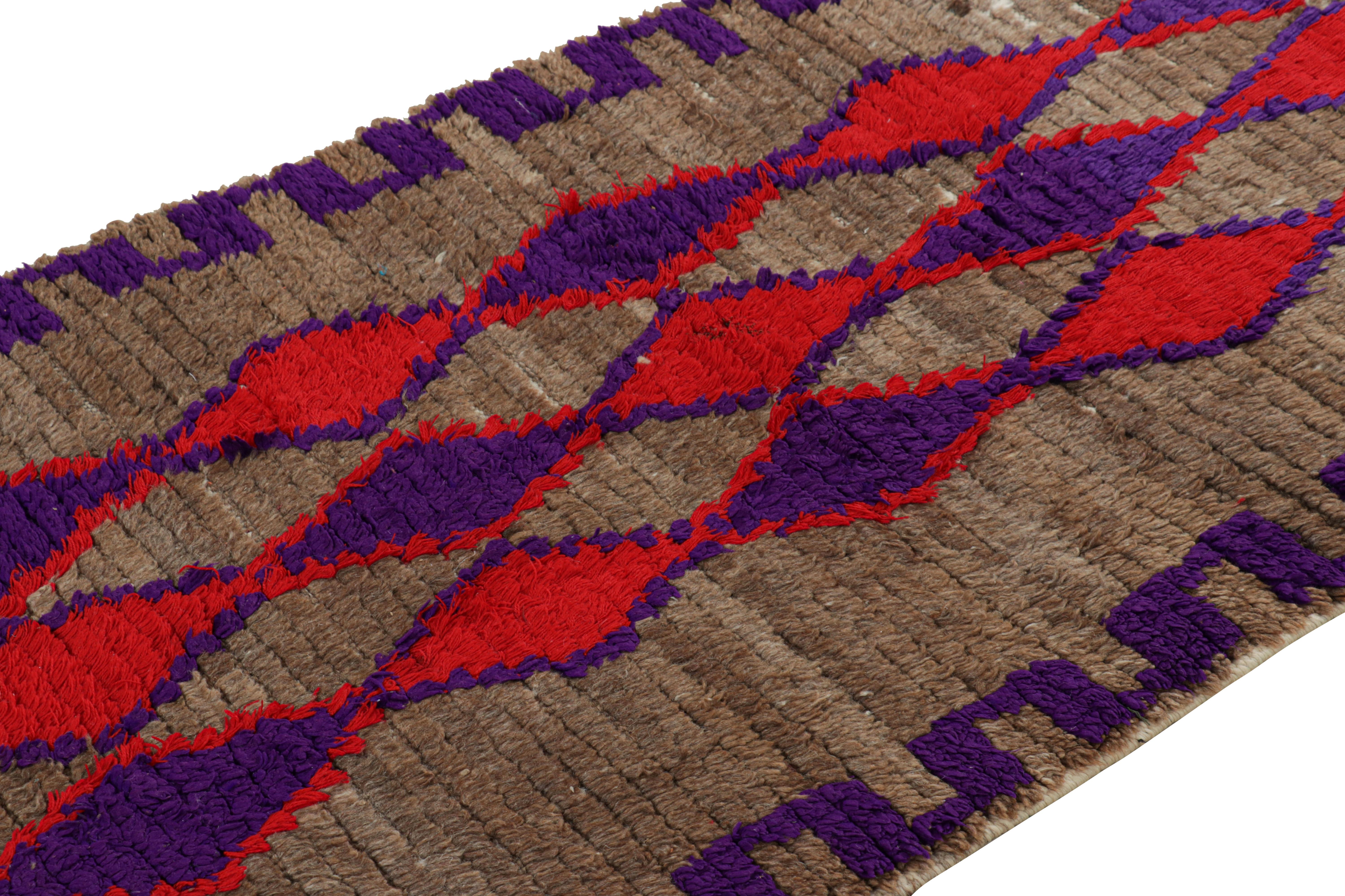 Hand-knotted in wool and originating from Morocco circa 1950-1960, this 3x10 vintage Moroccan rug is an extremely rare piece like so few of its provenance. 

On the Design: 

Admirers of the craft will note what an exceptional find this shabby chic