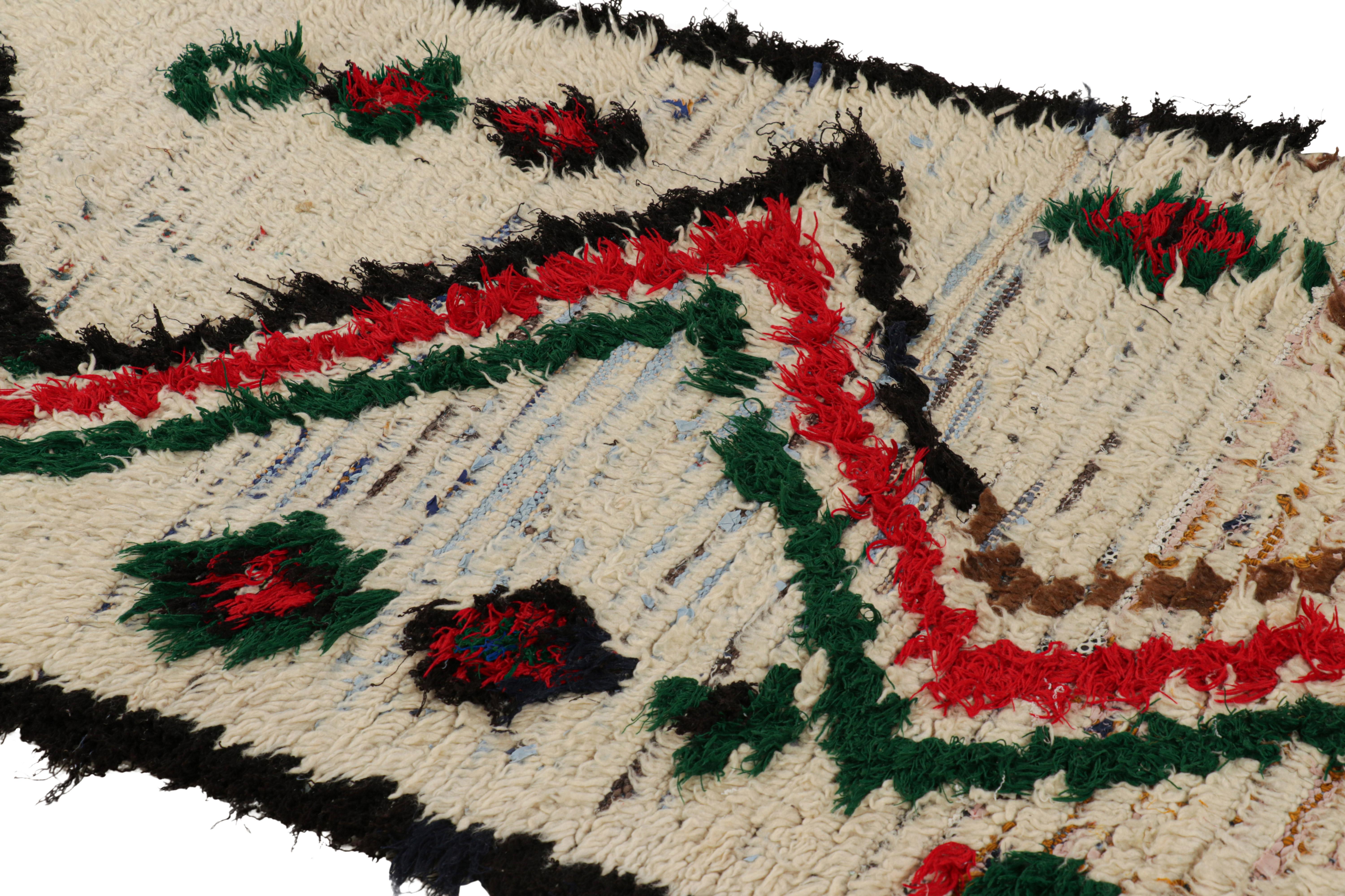 Hand-knotted in wool and originating from Morocco circa 1950-1960, this 3x6 vintage Moroccan rug is an extremely rare piece like so few of its provenance. 

On the Design: 

Admirers of the craft will note what an exceptional find this shabby chic