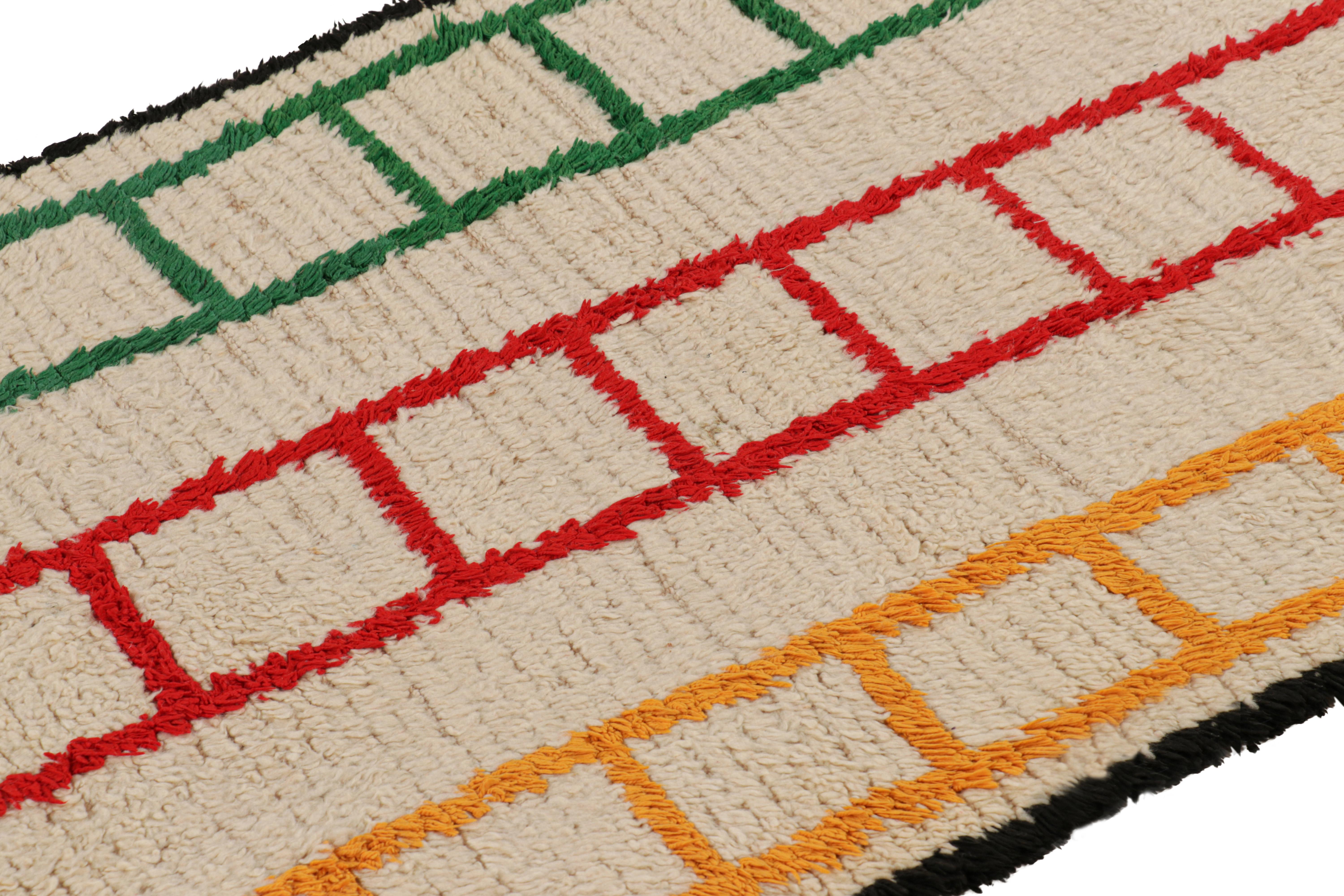 Hand-knotted in wool and originating from Morocco circa 1950-1960, this 3x6 vintage Moroccan rug is an extremely rare piece like so few of its provenance. 

On the Design: 

Admirers of the craft will note what an exceptional find this shabby chic